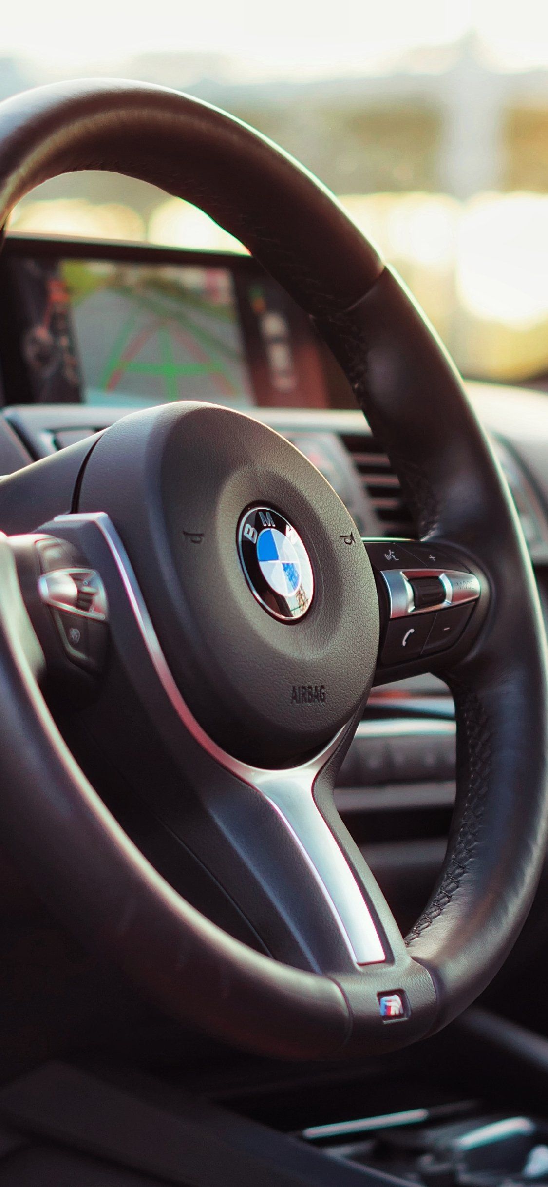 1125x2436 BMW Steering Elegance