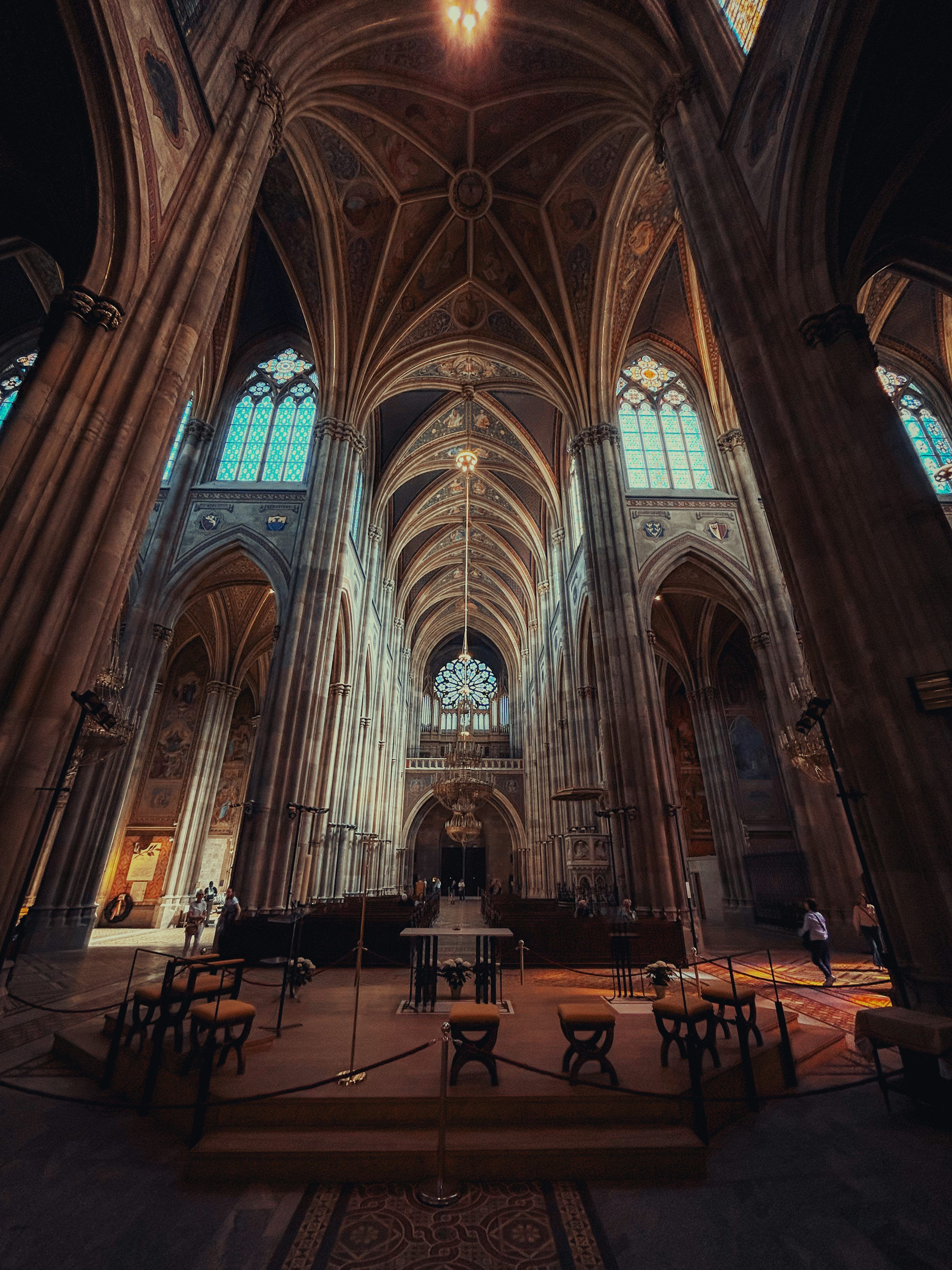 3000x4000 Grand interior of a gothic cathedral with tall arched ceilings. photo