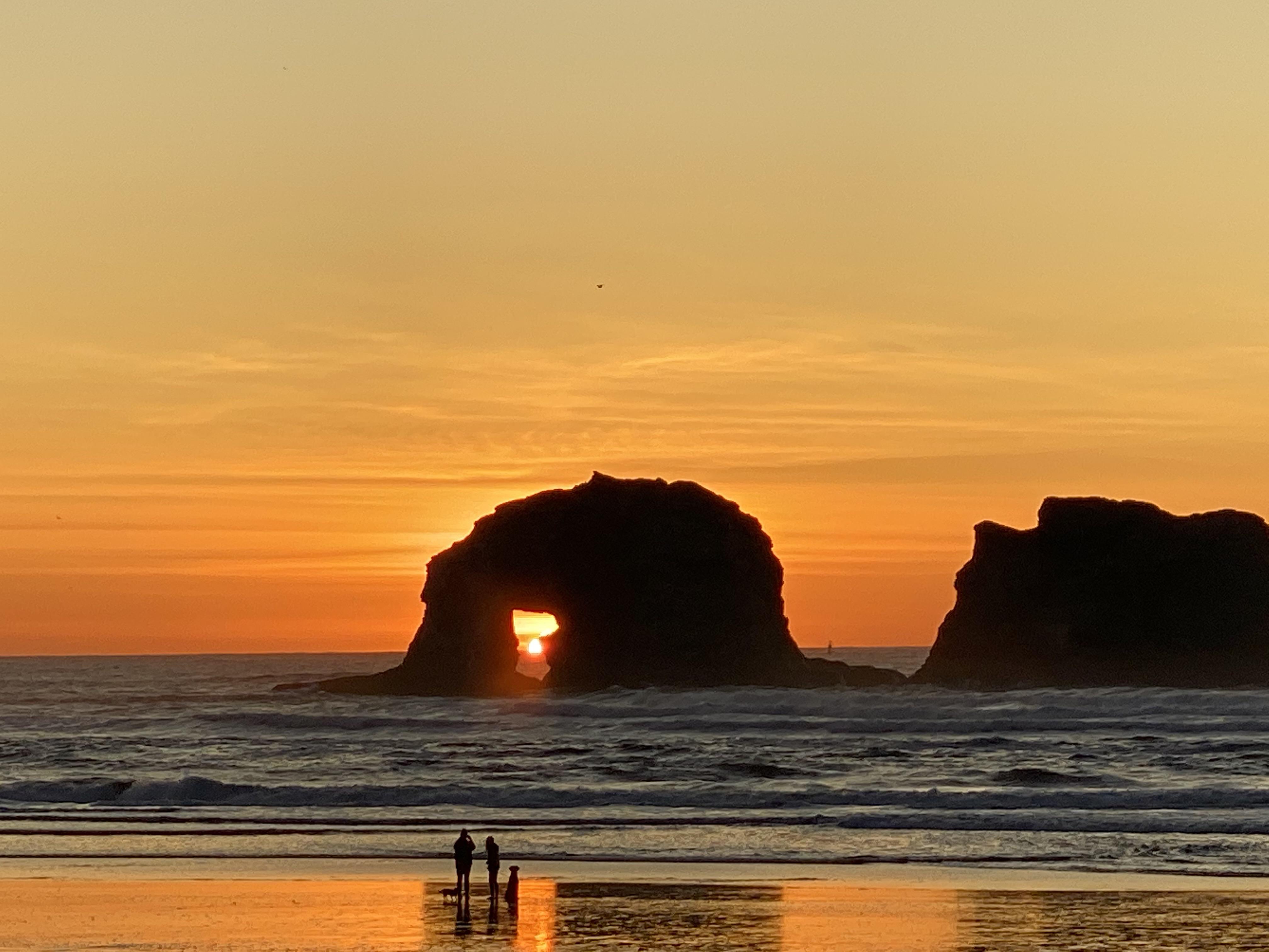 4032x3024 The sunset at Rockaway Beach tonight was amazing. Tried my best to line up the sun in the arch of Twin Rocks