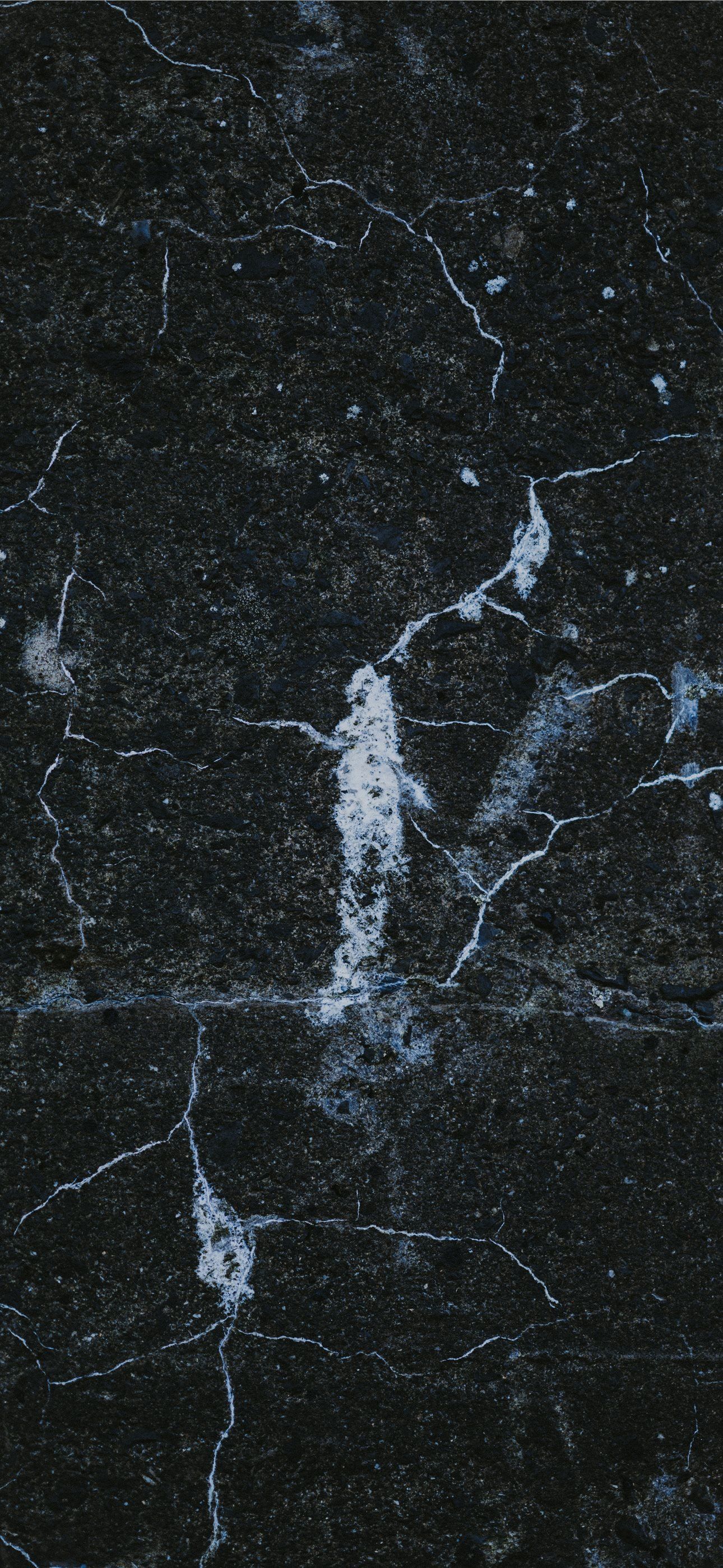 1290x2796 a close up of a black marble surface iPhone Wallpaper Free Download