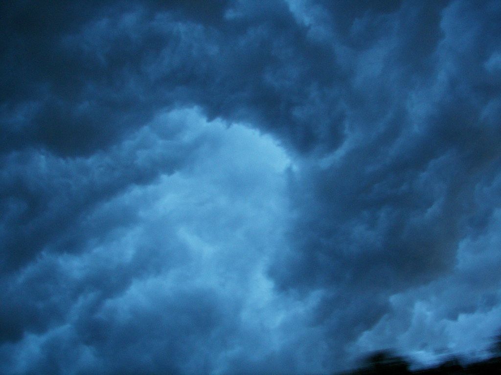1024x768 The eye of the storm. A Storm Brewin' overhead