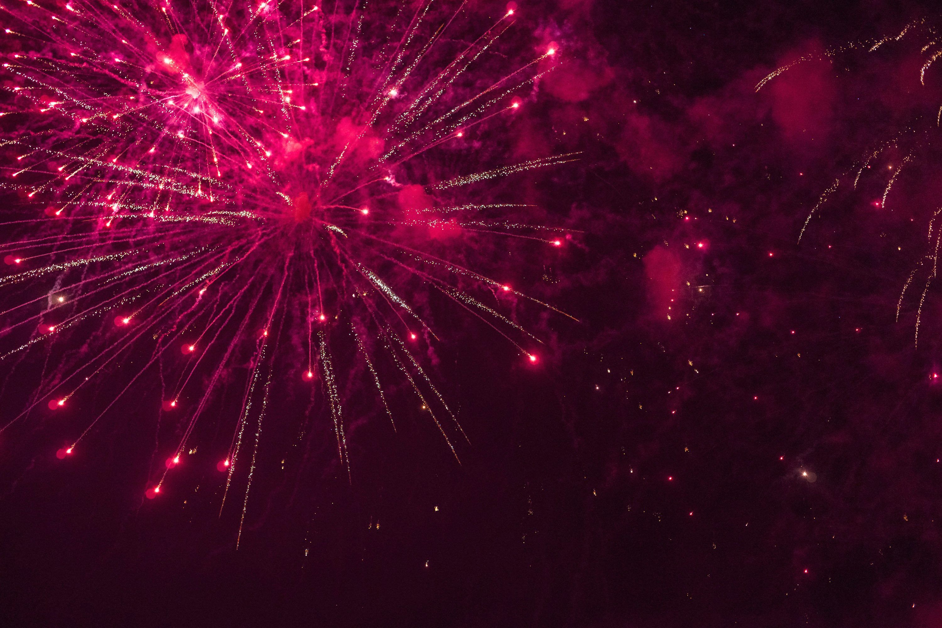 3000x2000 A large fireworks display in the night sky photo