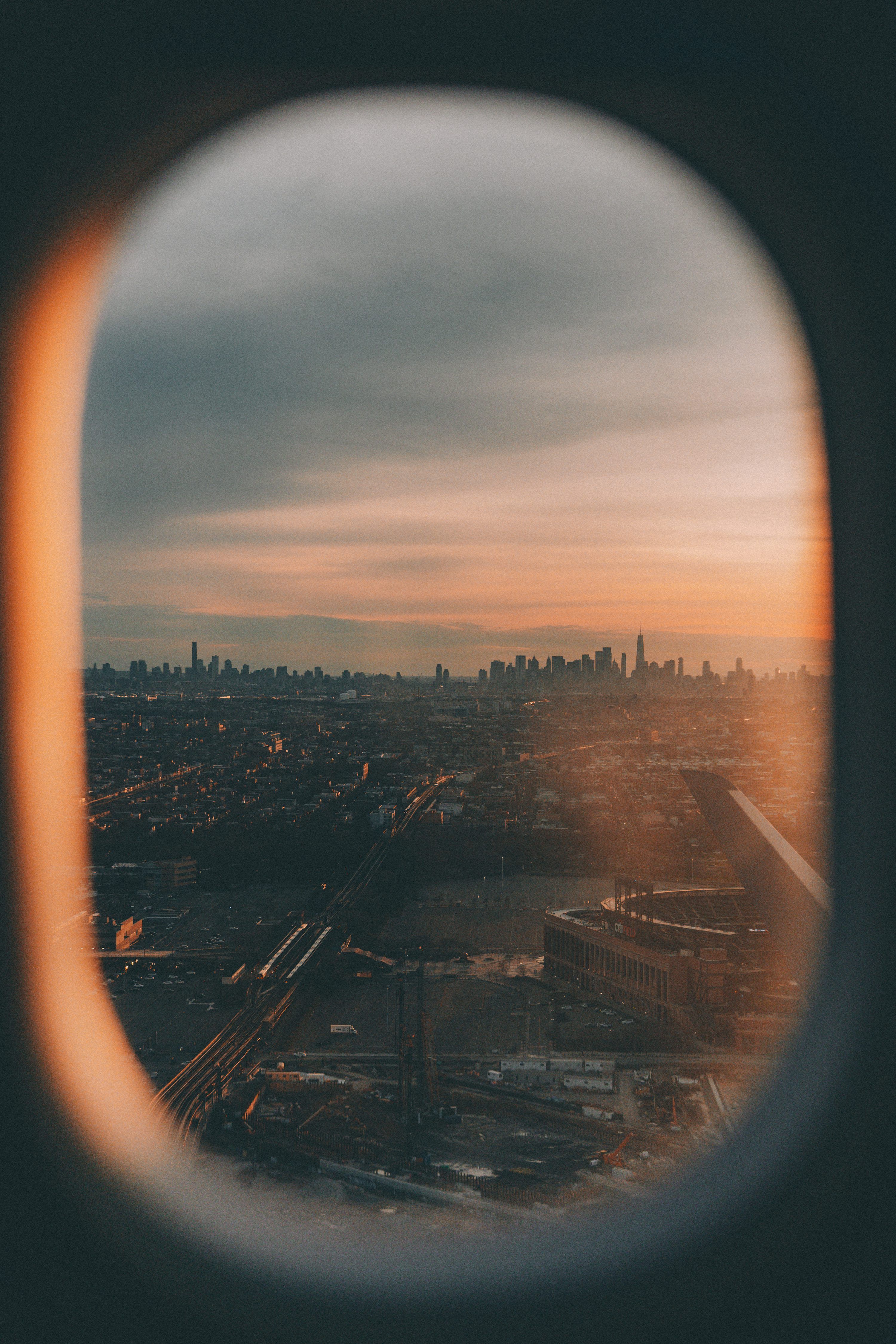 3000x4500 A view of a city from an airplane window photo