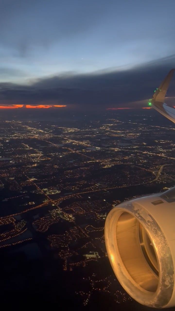 720x1280 Window View From An Airplane Flying Over A City At Dawn Free Stock Video Footage, Royalty Free 4K & HD Video Clip