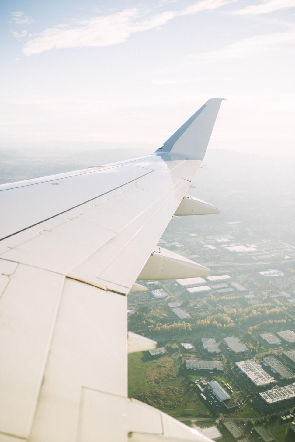 970x1455 Free of Airplane Wing Over City. Download Free Image and Free Illustrations