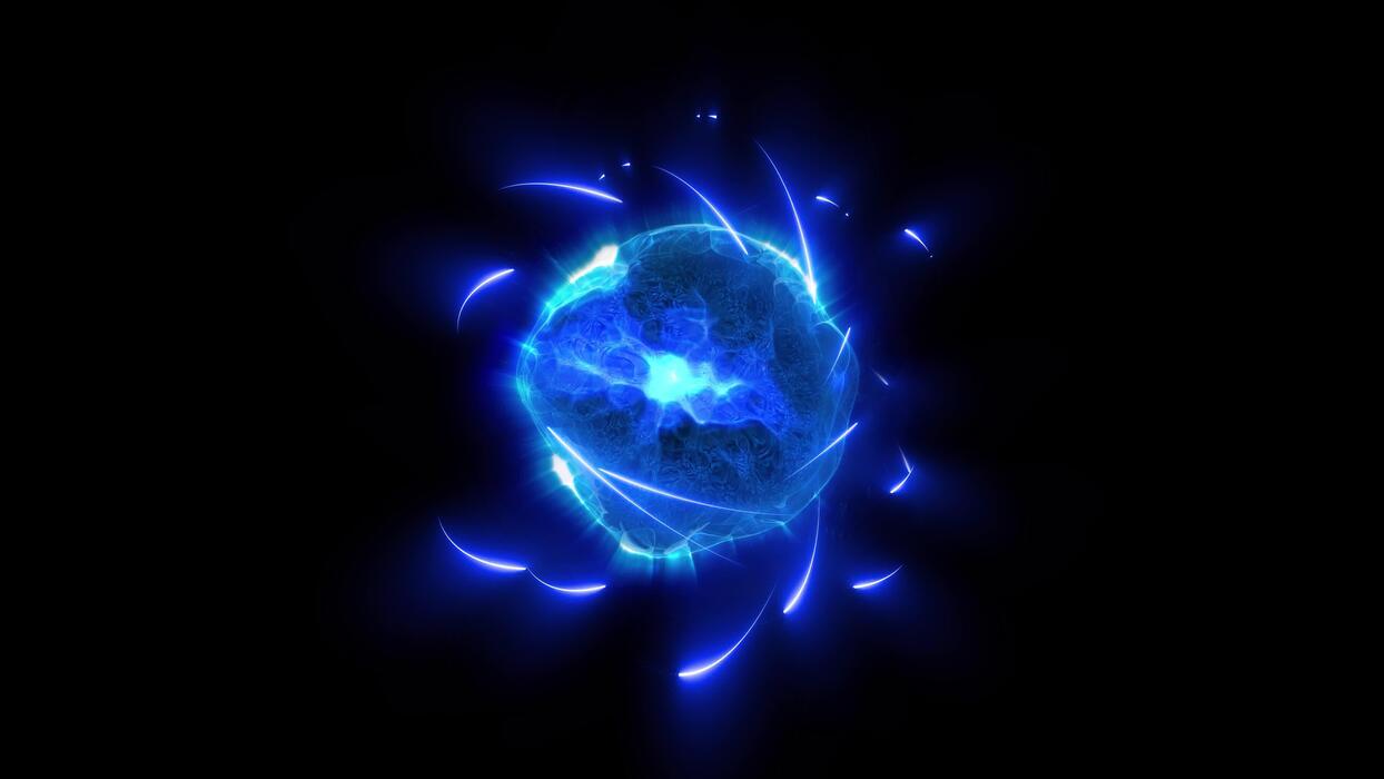 1244x700 A 3D Illustration Of A Blue Tinted Atom In Which Protons And Neutrons Increase Their Speed, Heating The Atom And Causing It To Explode