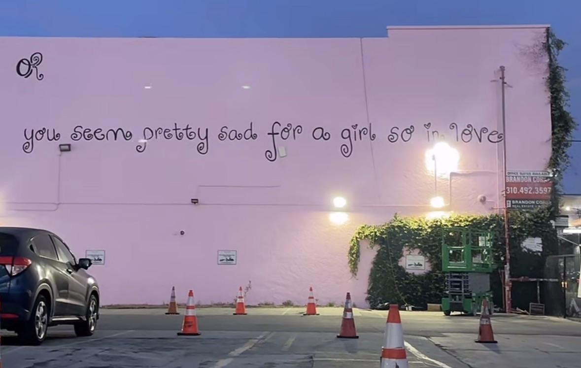 1179x747 Olivia Rodrigo's wall now says “you seem pretty sad for a girl so in love”