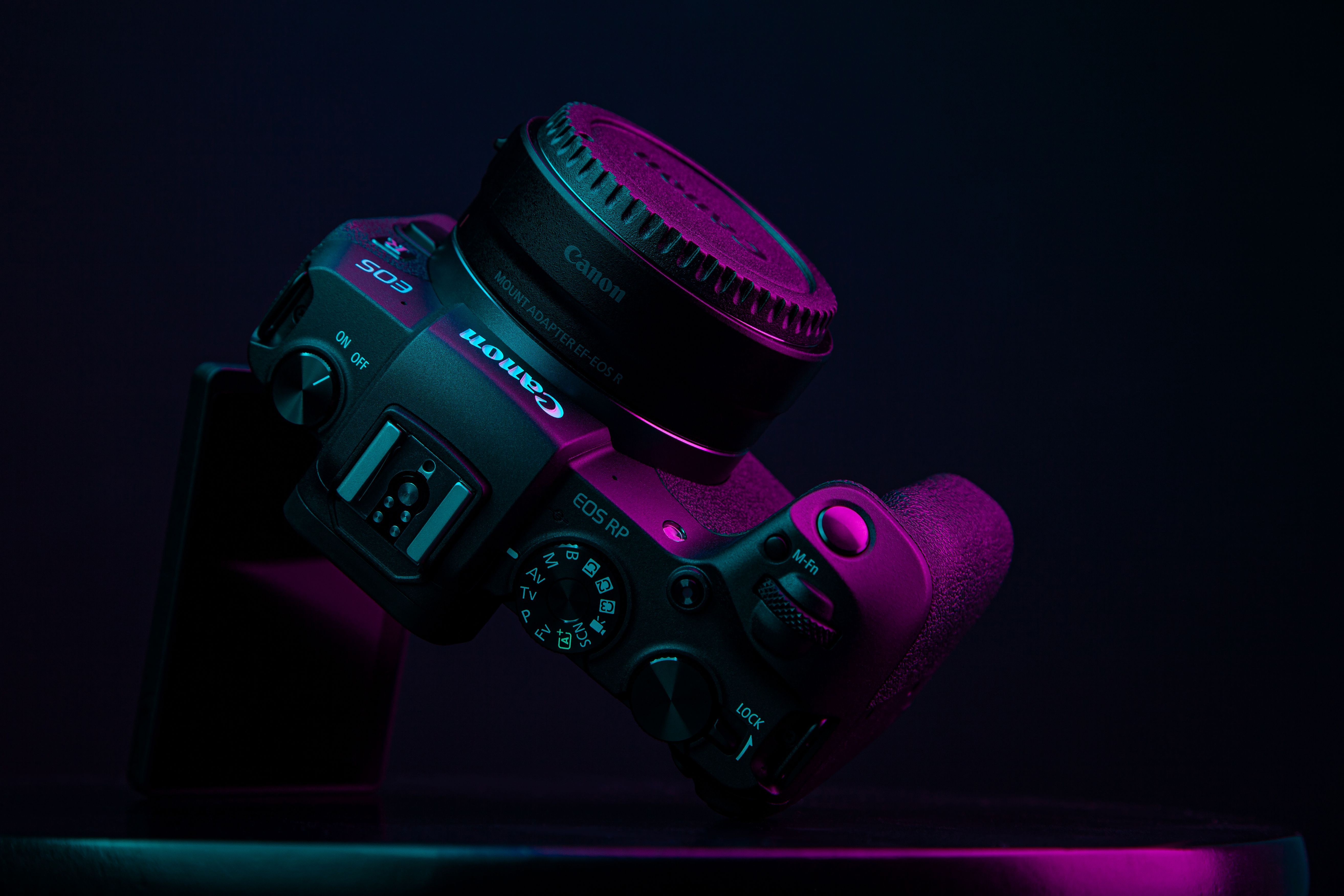 5254x3502 A Canon EOS SLR Camera against Black Background · Free