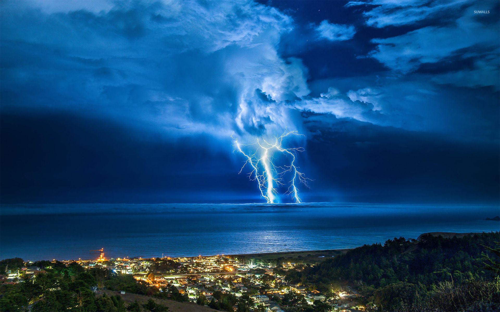 1920x1200 Thunderstorm over the coastal town wallpaper wallpaper