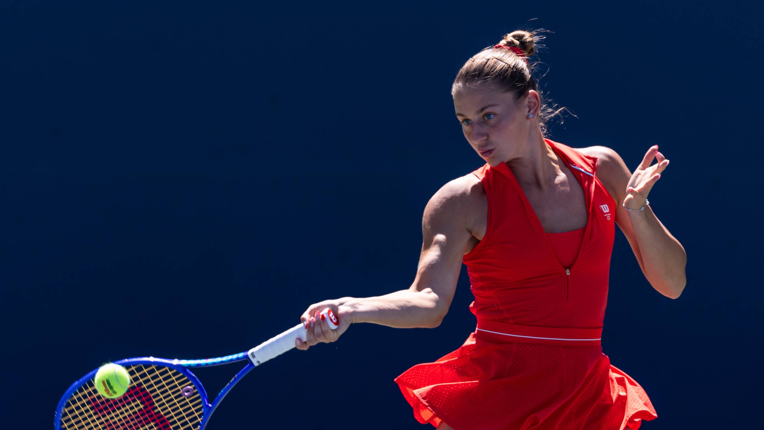 2560x1440 Tennis Star Marta Kostyuk Sizzles On Vacation In Red Swimsuit