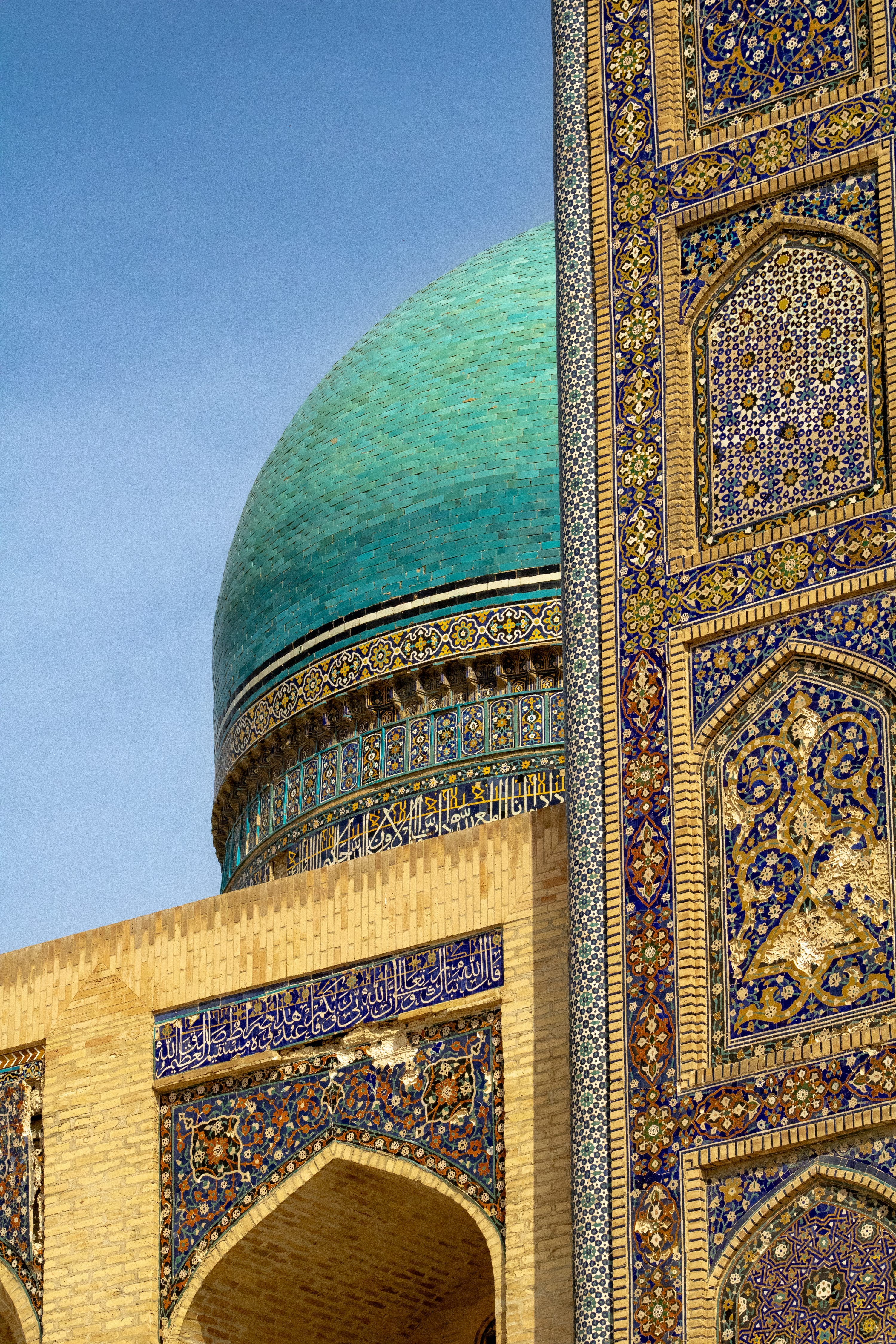 3000x4500 Turquoise dome and intricate tilework on ancient building photo