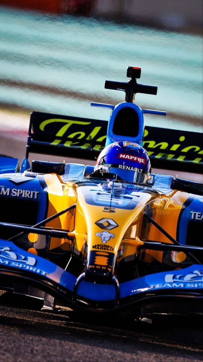 675x1200 F1 Wallpaper HD and Yellow Race Car. Renault f1 car wallpaper, Blue and yellow formula 1 car, Race cars