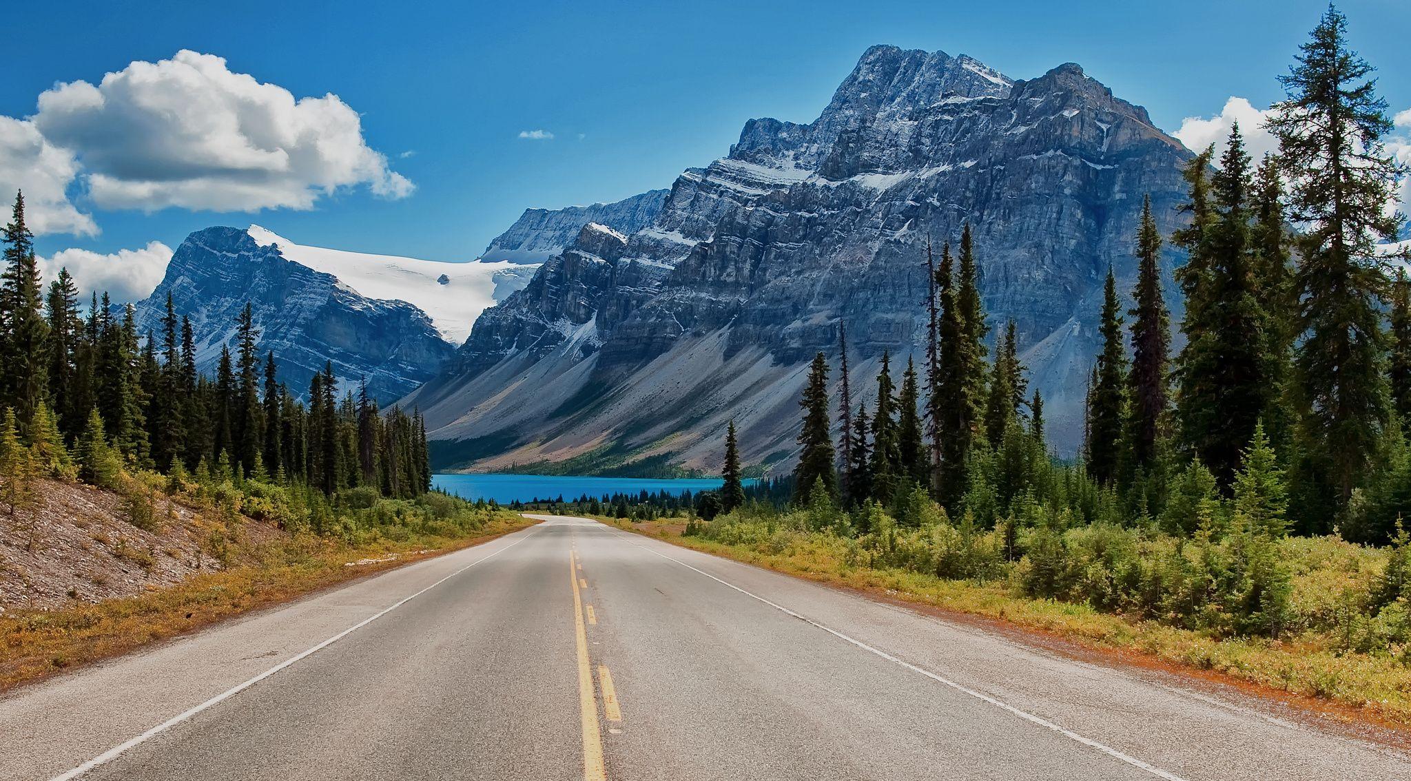 2048x1134 Canada Canadian Rockies road trees lake mountains wallpaper