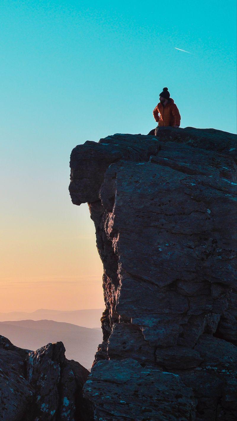 800x1420 Download wallpaper 800x1420 rock, silhouette, height, mountains