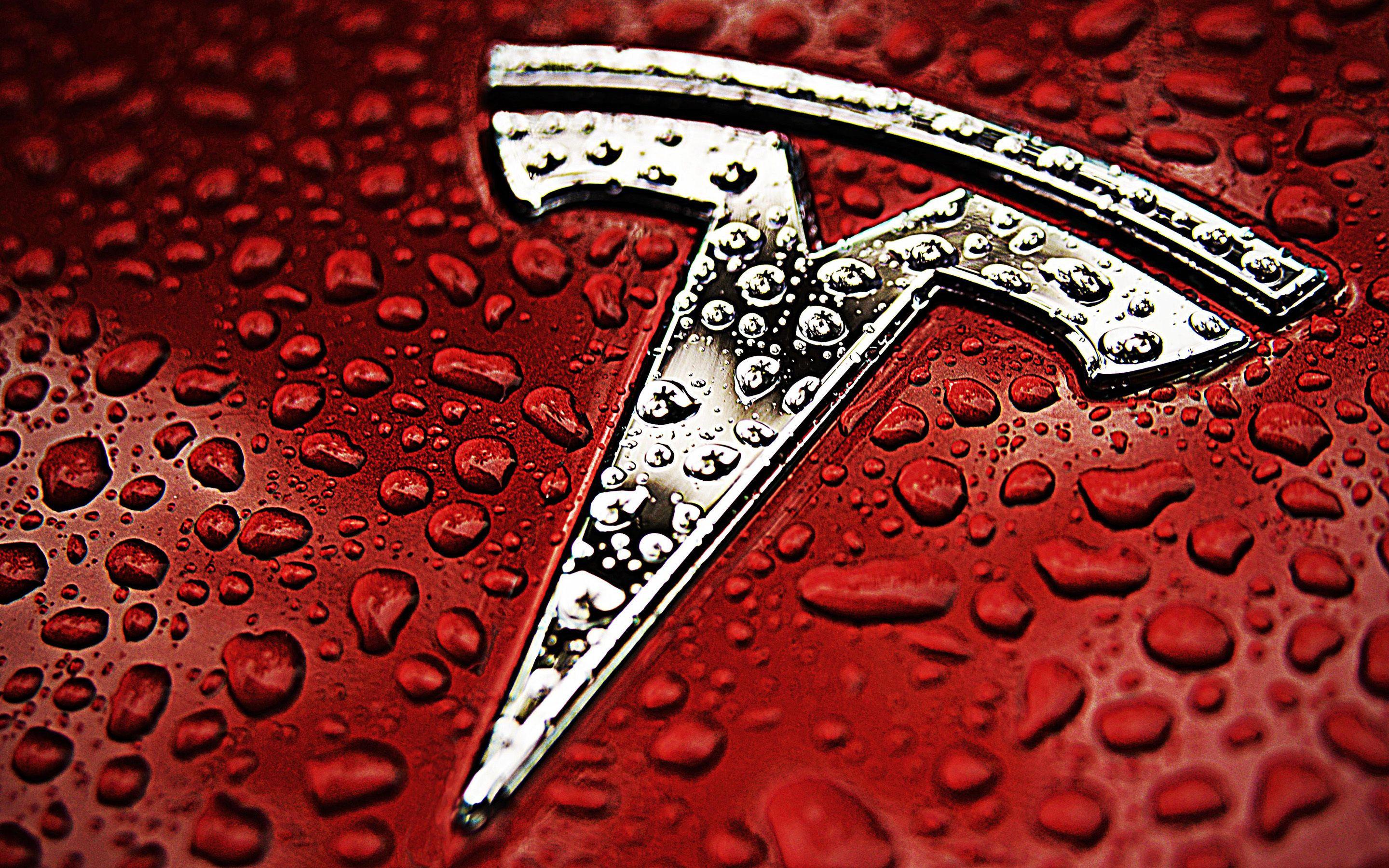 2880x1800 High resolution wallpaper of Tesla Motors, image of red, black