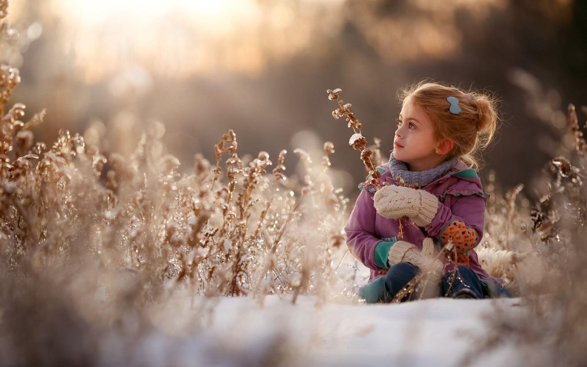 1920x1200 Wallpaper Cute little girl, winter, snow, bushes 1920x1200 HD