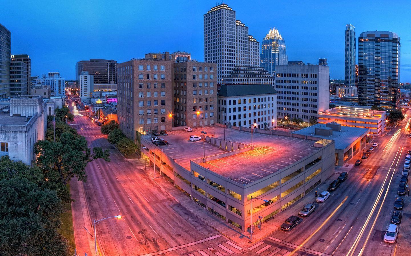 1440x900 Download wallpaper 1440x900 austin, texas, buildings, cars, night