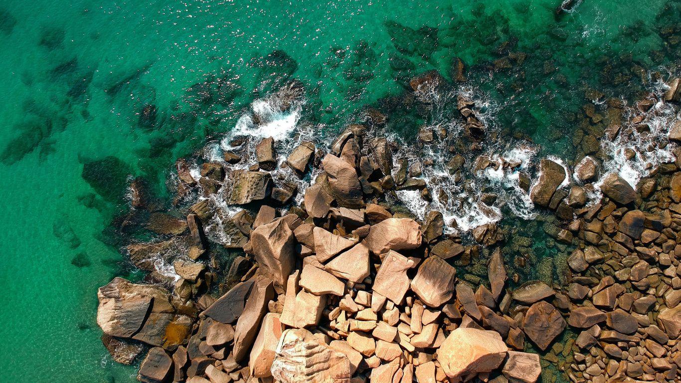 1366x768 Download Sea, rocks, coast, drone shot, nature wallpaper, 1366x768