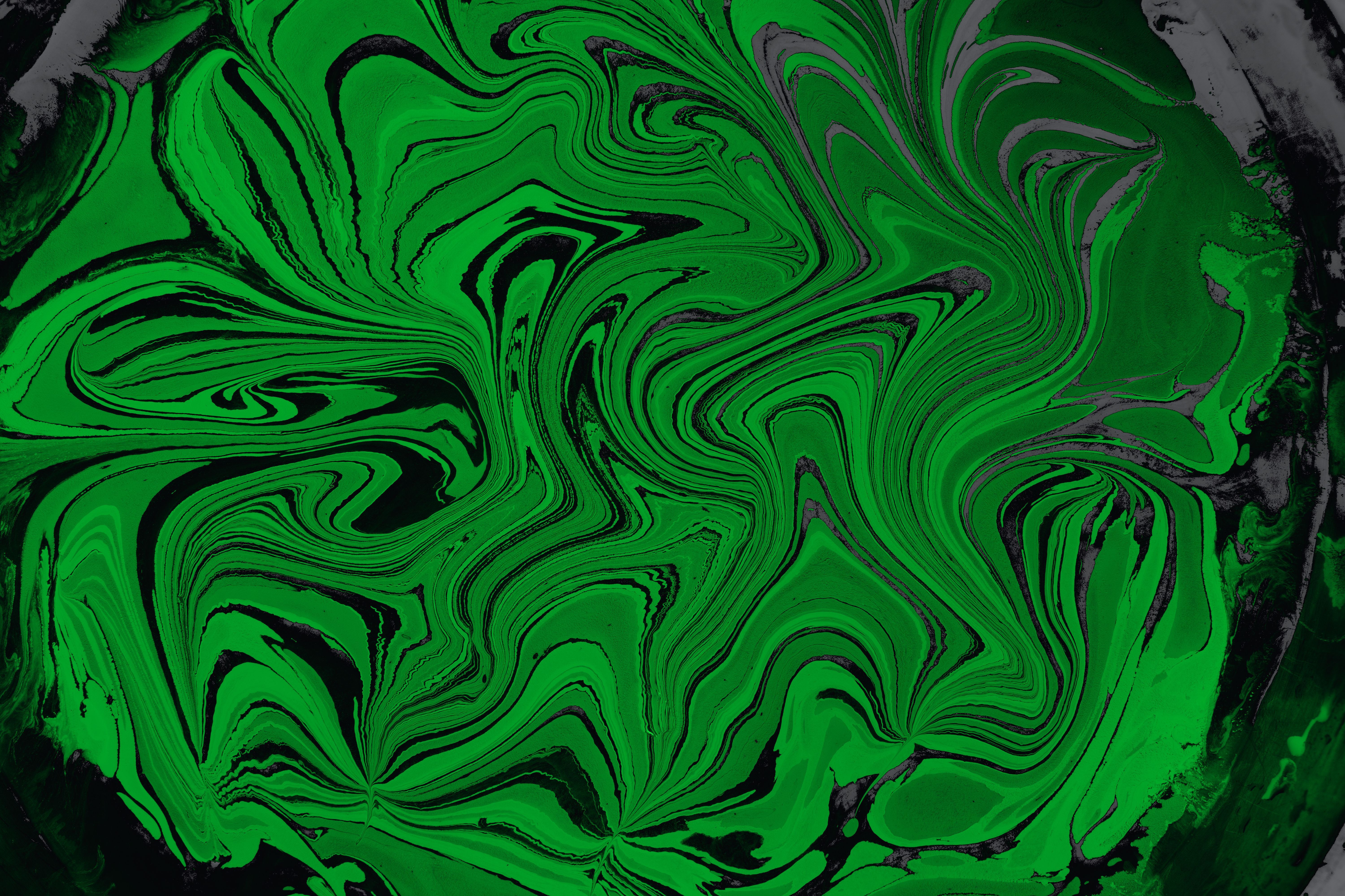 6000x4000 A green and black swirl pattern on a black background · Free