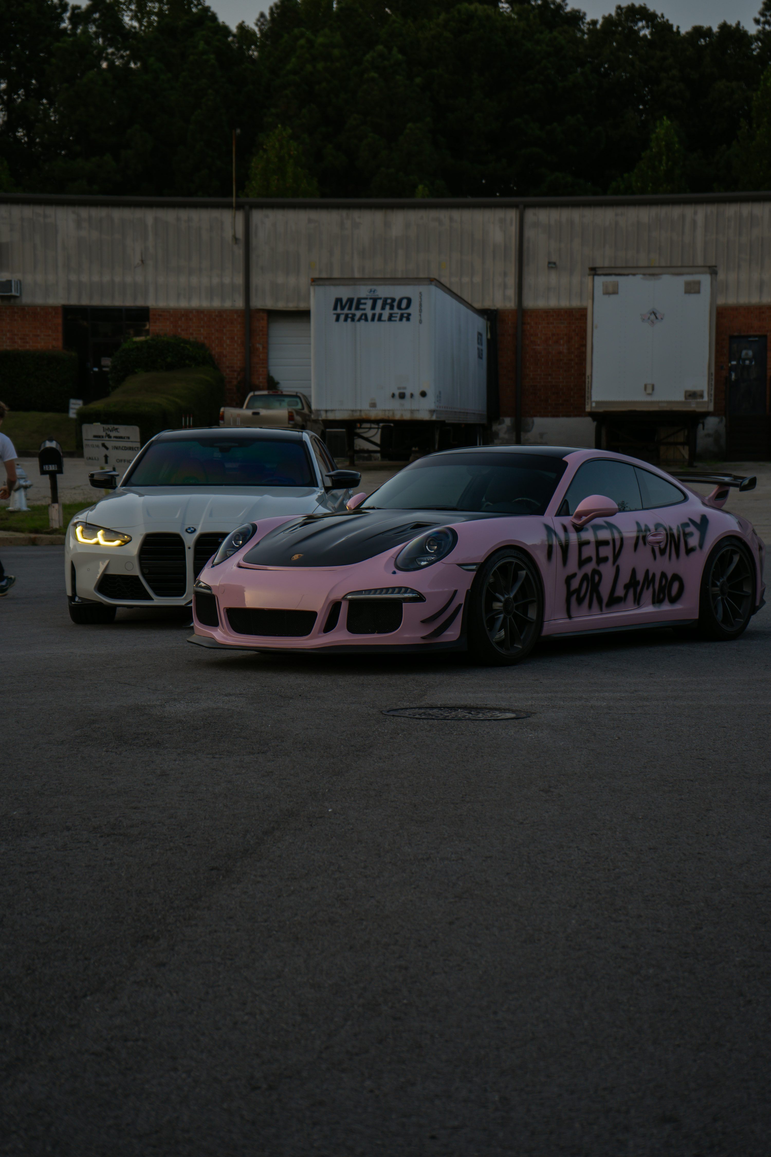3000x4500 Pink porsche with need money for lambo text. photo