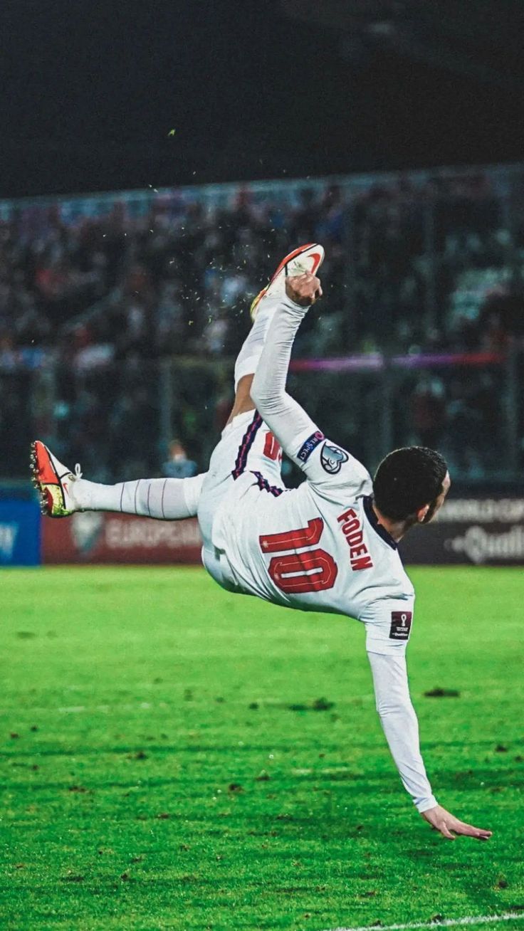 736x1308 Knee slide football wallpaper. Slide tackle wallpaper, Phil foden wallpaper england, Soccer players