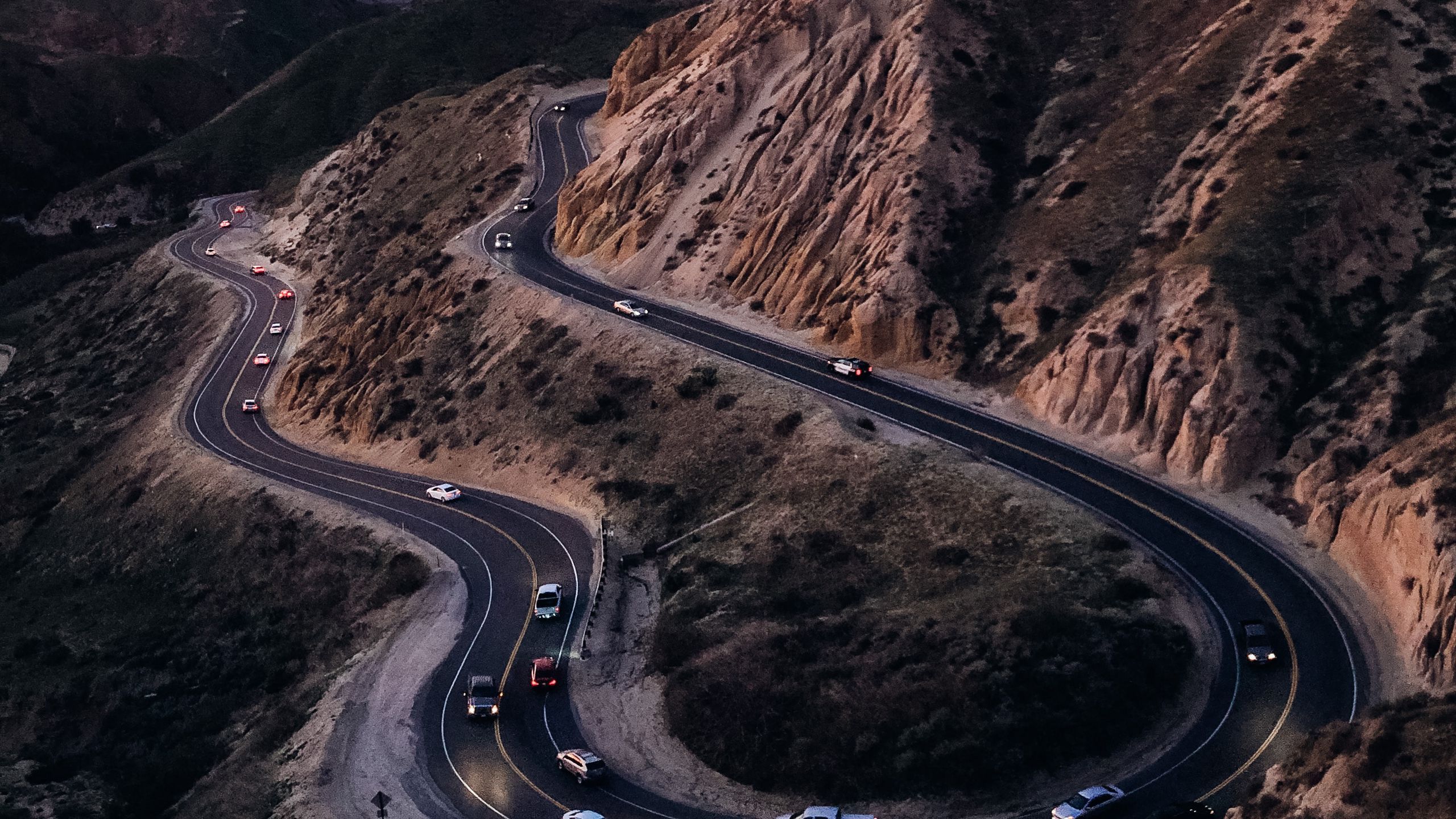 2560x1440 Download wallpaper 2560x1440 mountains, road, cars, aerial view, nature widescreen 16:9 HD background