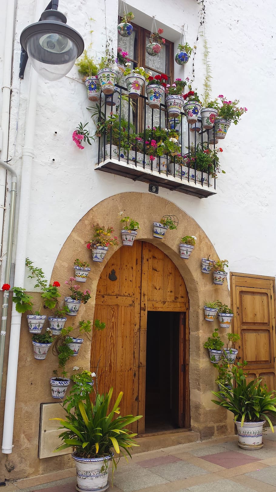 910x1618 Spanish village 1080P, 2K, 4K, 5K HD wallpaper free download
