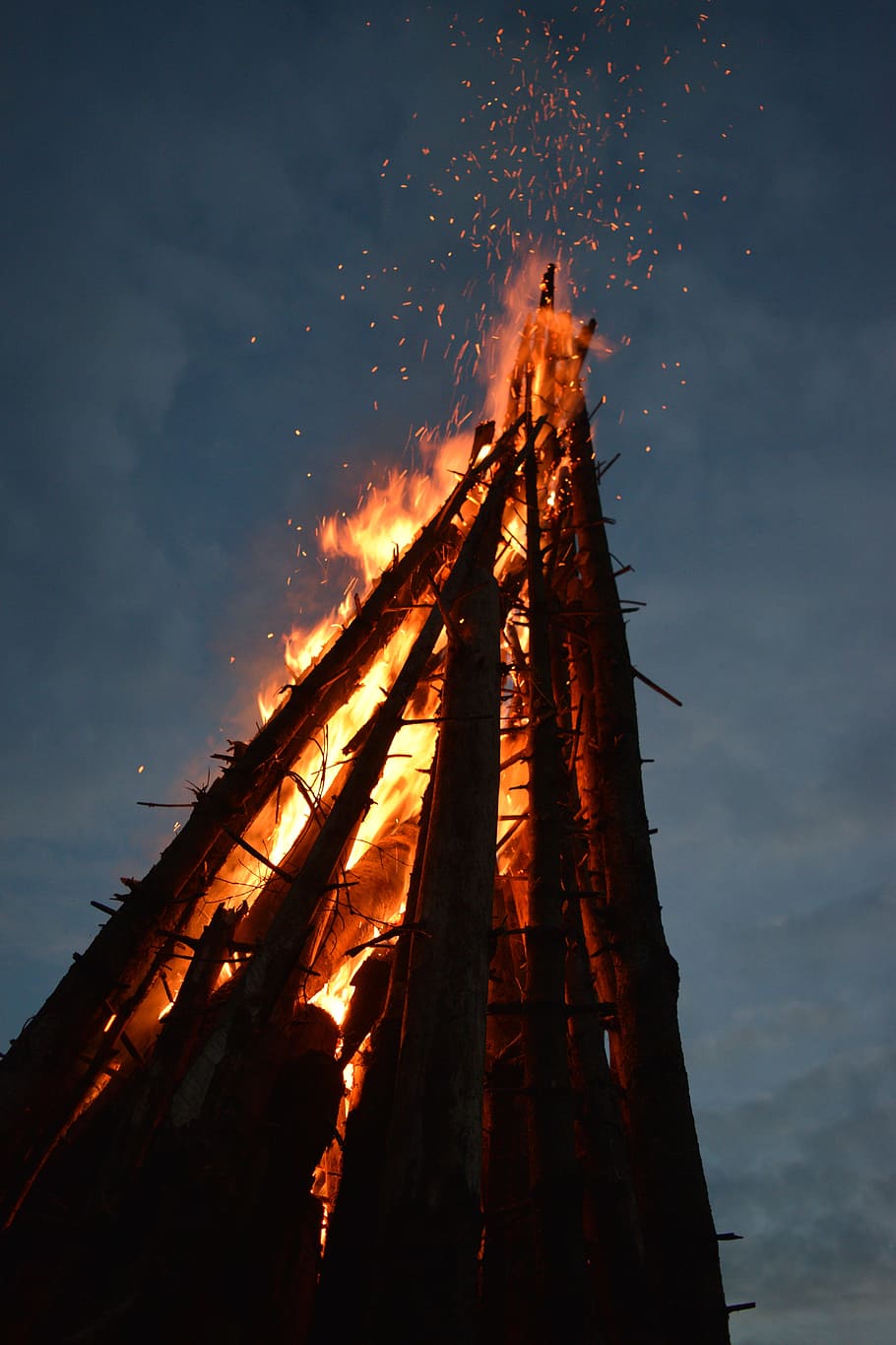 910x1365 HD wallpaper: fire, bonfire, big, tall, night, outdoor, firewood, fireplace