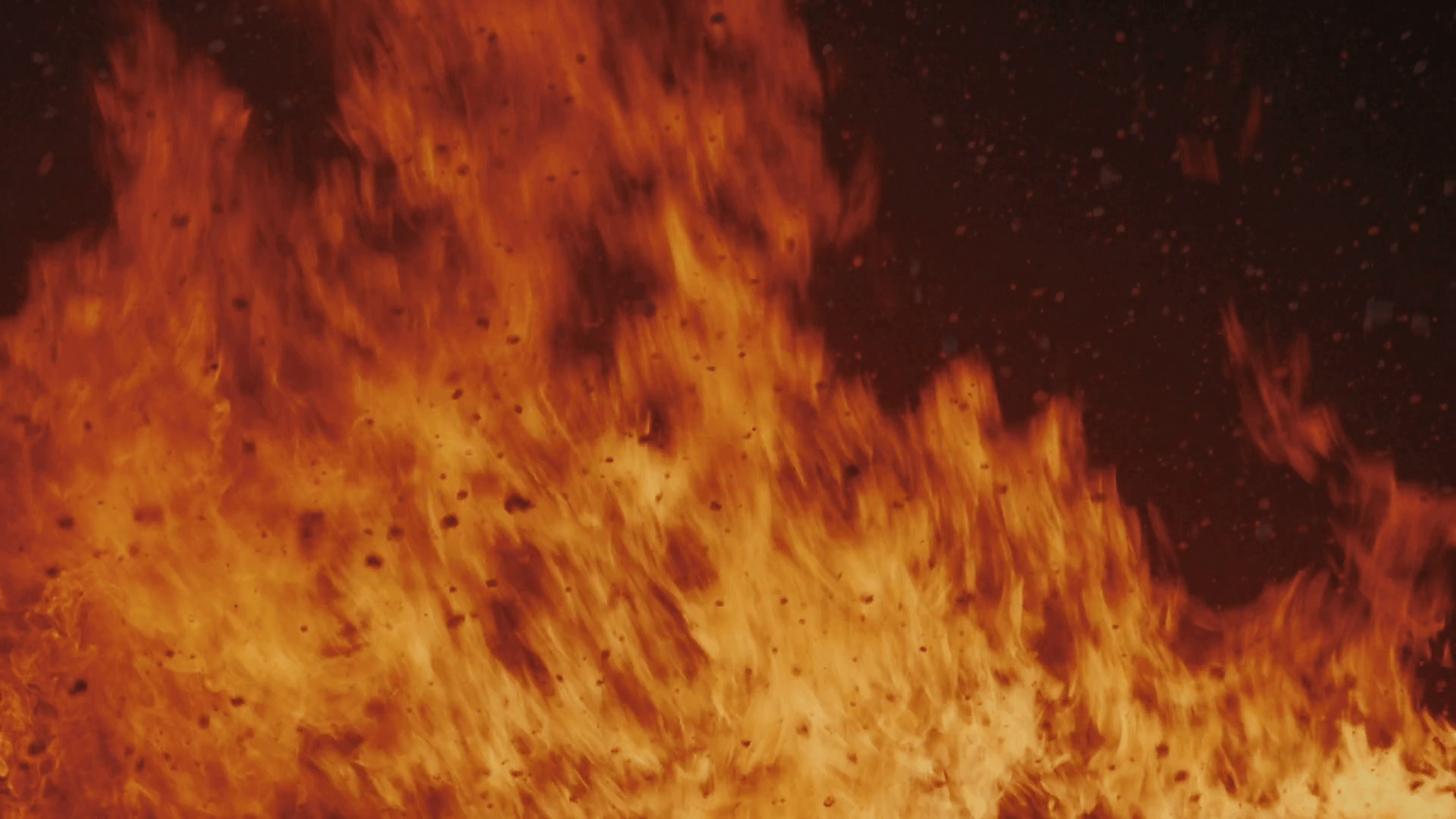 1920x1080 Fire flames on black background. Fire background. Snow falling on burning fire. Close up of flames background. Closeup of big fire flames on dark background. Bonfire flames