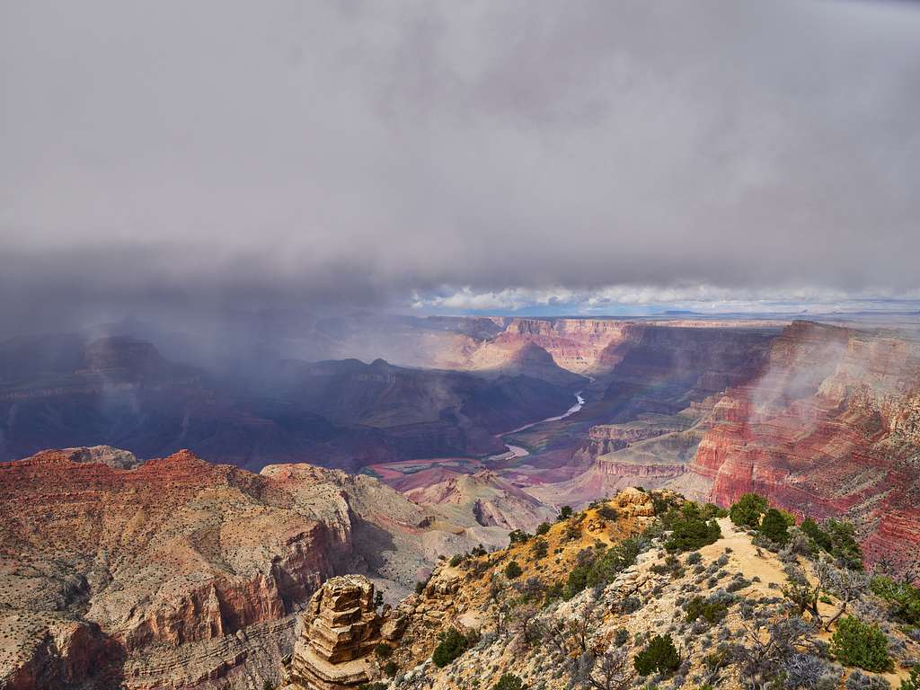1024x768 A storm brews over the abyss in Grand Canyon National Park