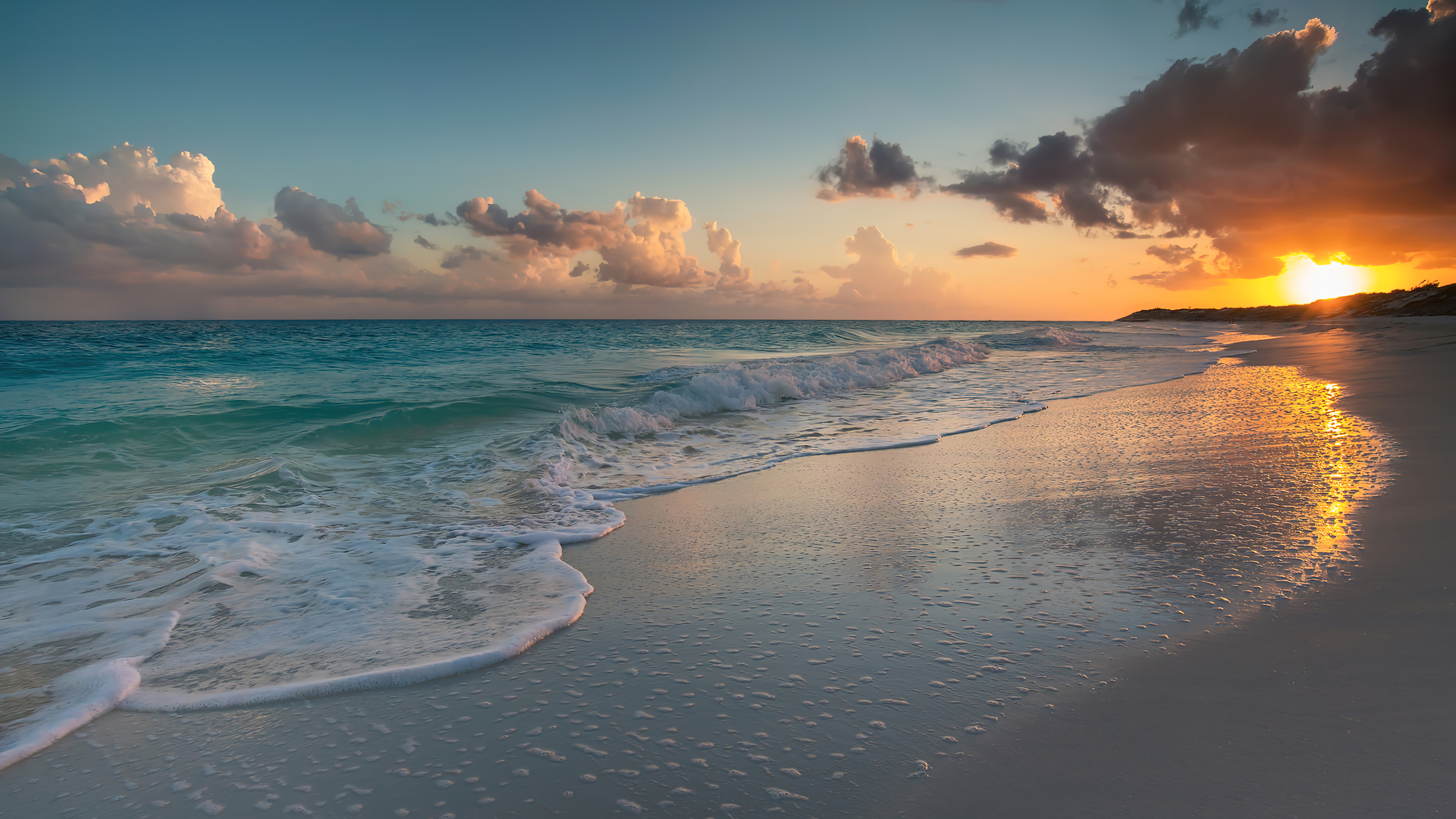 3840x2160 Waves in the beach at sunset Wallpaper 4K for Desktop