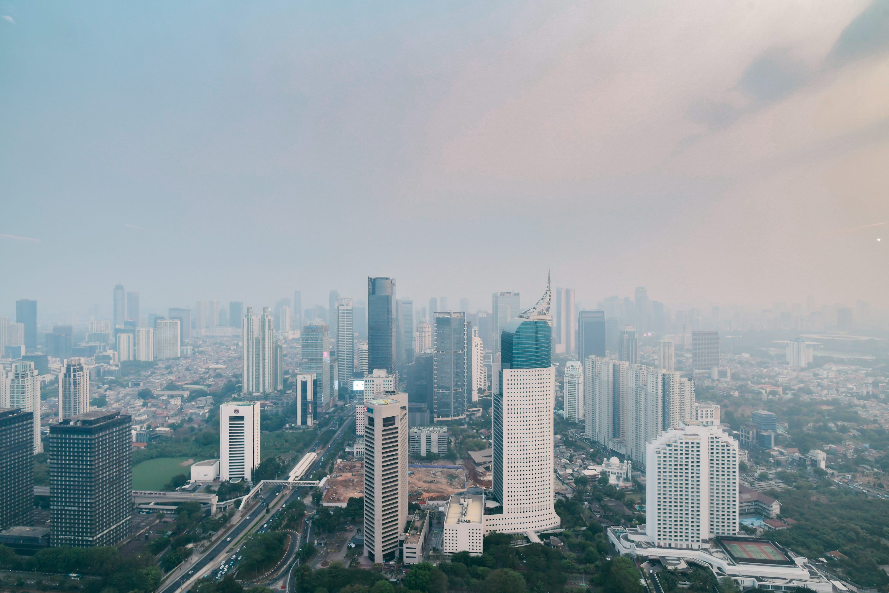 3000x2000 An aerial view of a city with tall buildings photo