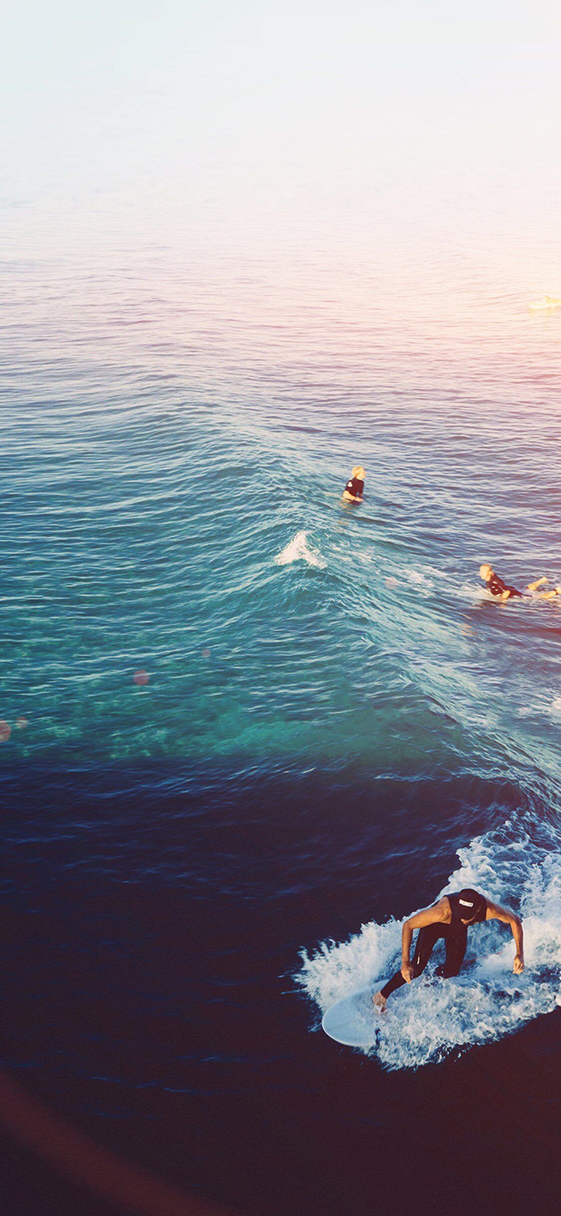 1125x2436 Surfing Wave Summer Sea Ocean Flare iPhone Wallpaper