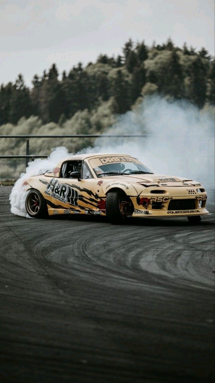 726x1290 Yellow JDM Car with Flames on Race Track. Mazda mx5 drift car, Miata drift, Aesthetic