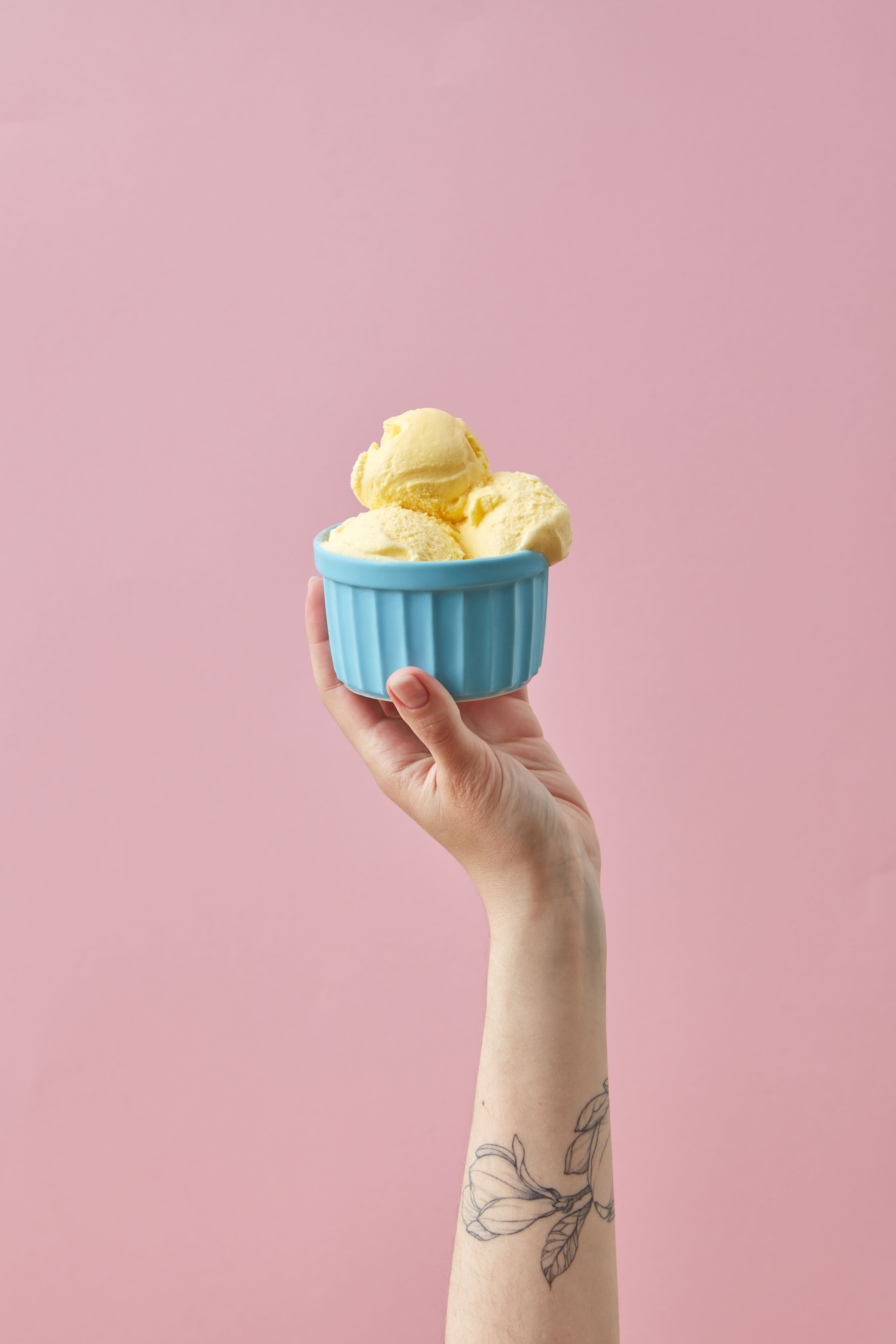 4606x6908 Hand Holding Cup of Vanilla Ice Cream · Free