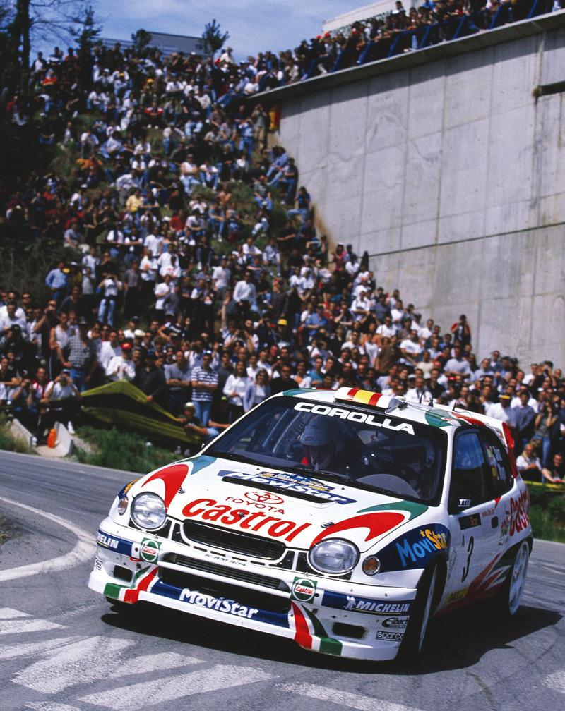 800x1008 a Toyota Corolla WRC drifting