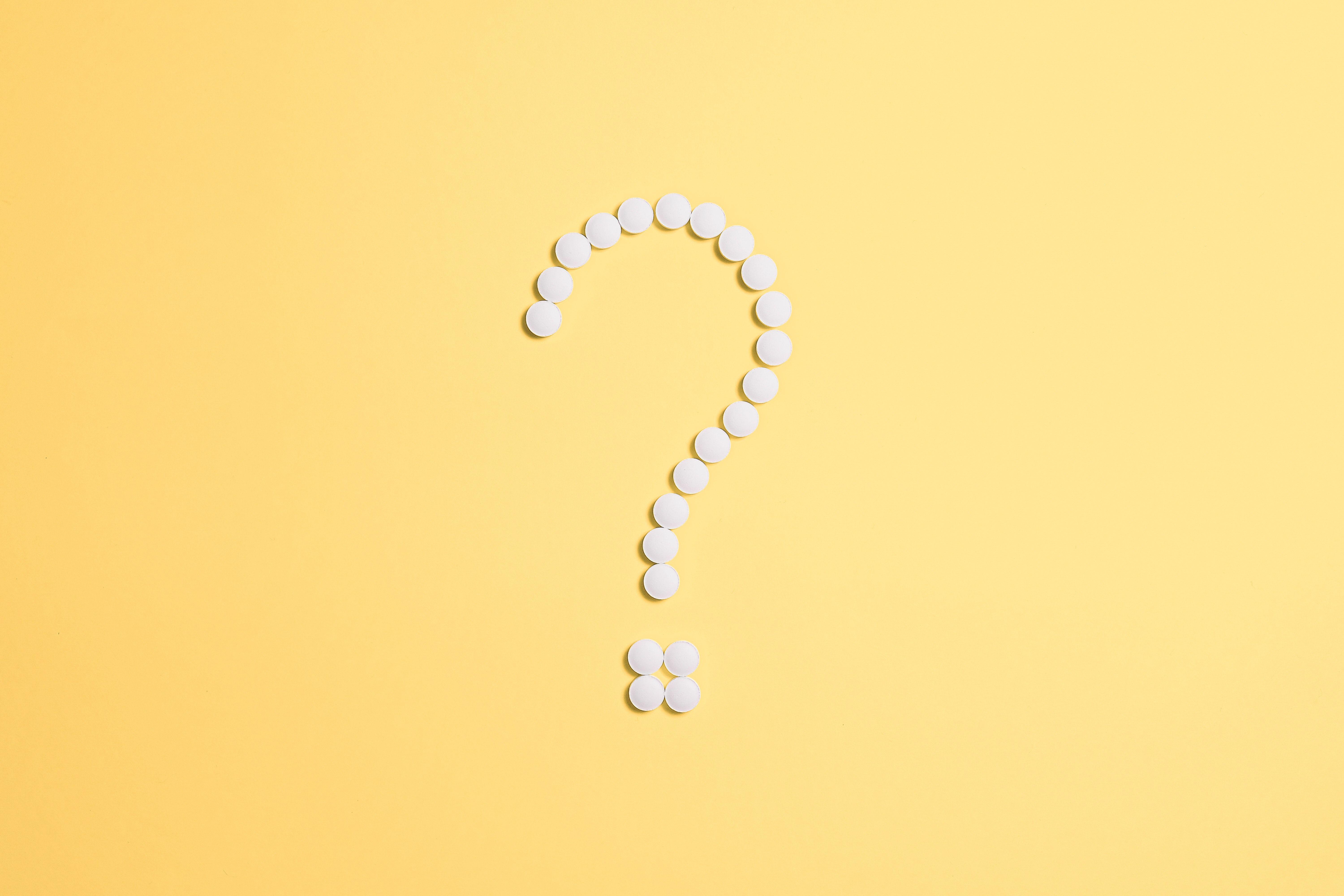 6000x4000 White Beads on Question Mark Sign · Free