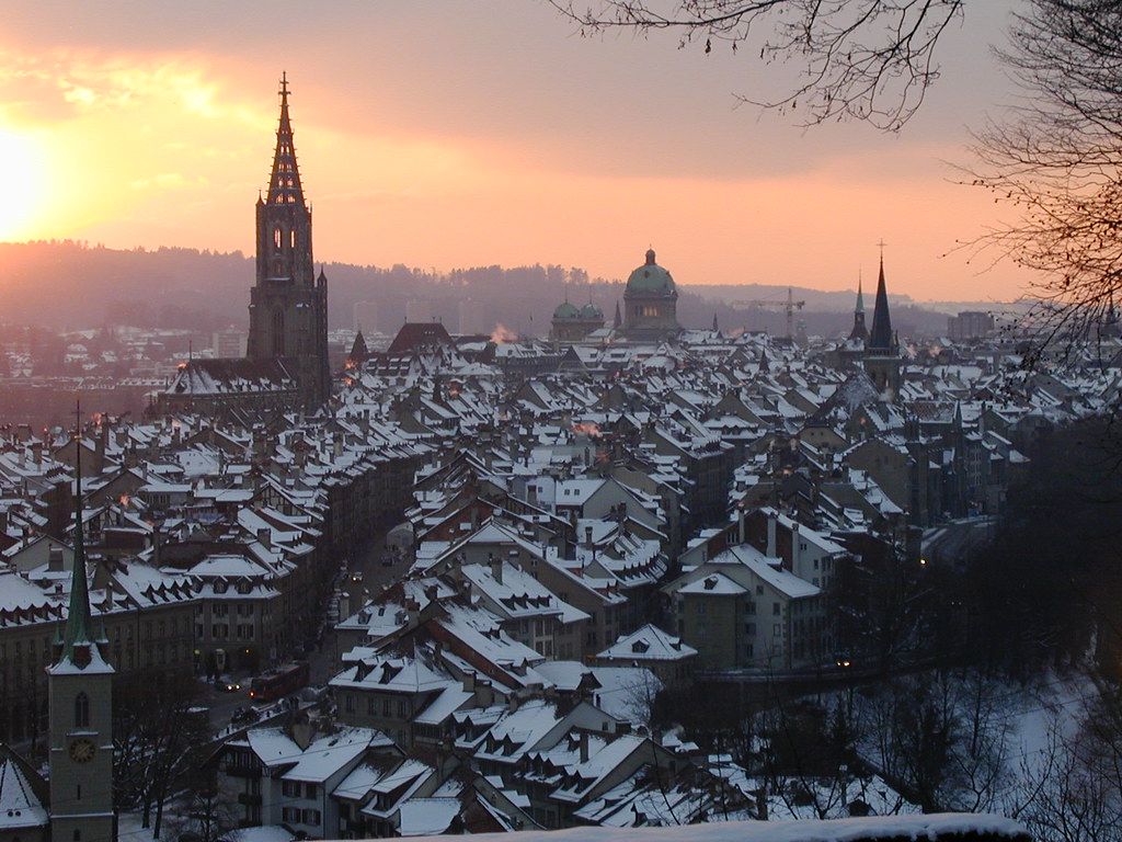 1024x768 Winter Sunset Switzerland. A view over the city of B
