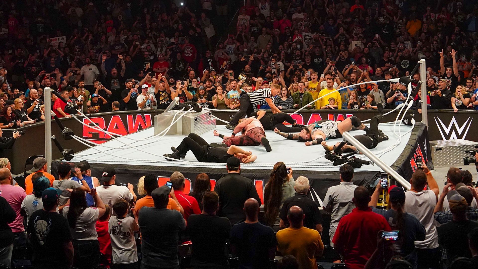 1920x1080 Watch moment WWE ring COLLAPSES leaving 'bodies everywhere' as commentators scream 'what is there left to destroy now'