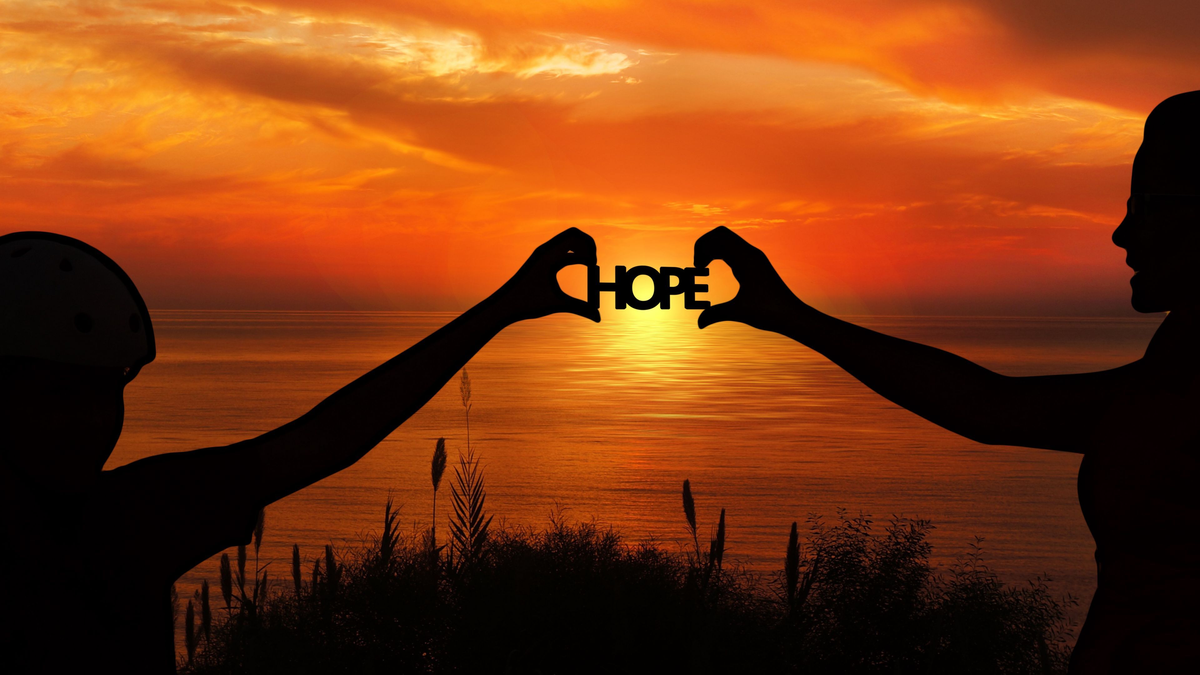 3840x2160 Download wallpaper 3840x2160 hope, hands, silhouettes, sunset, horizon, motivation 4k uhd 16:9 HD background