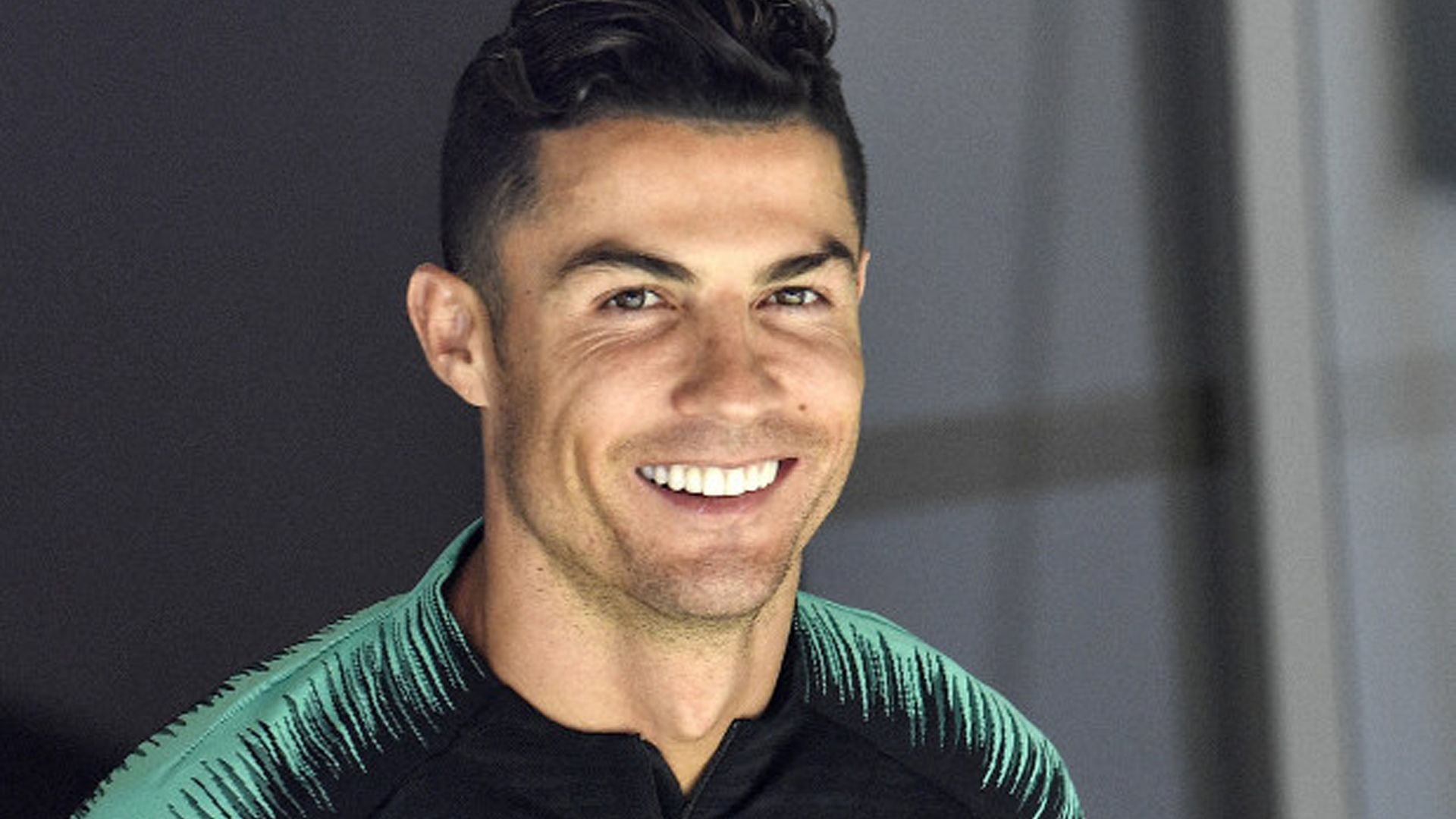 1920x1080 Smiling Cristiano Ronaldo Is Wearing Green Dress HD Cr7 Wallpaper