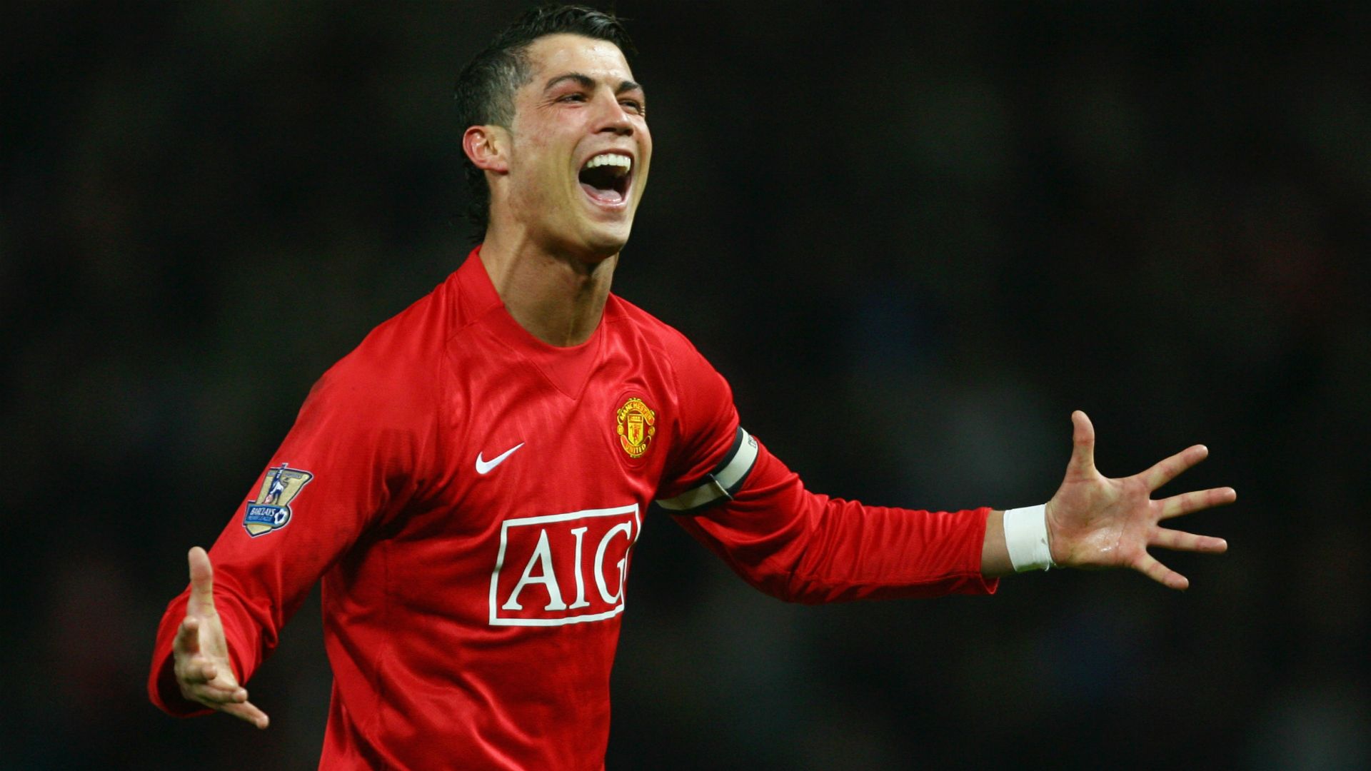 1920x1080 Happy Face Of Cristiano Ronaldo CR7 Is Wearing Red Sports Dress In Black Background HD Ronaldo Wallpaper