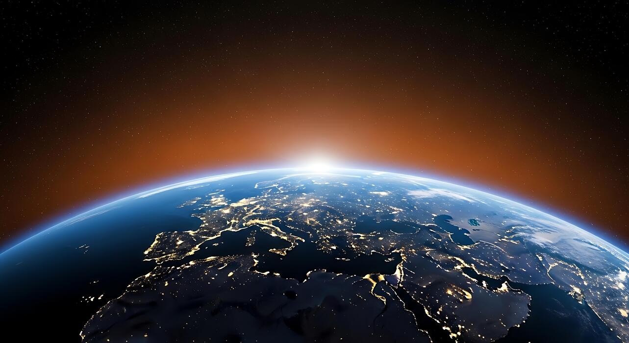 1283x700 Earth From Space at Night Europe Illuminated by City Lights Sunrise Over Horizon Celestial Beauty Cosmic View 4K Wallpaper