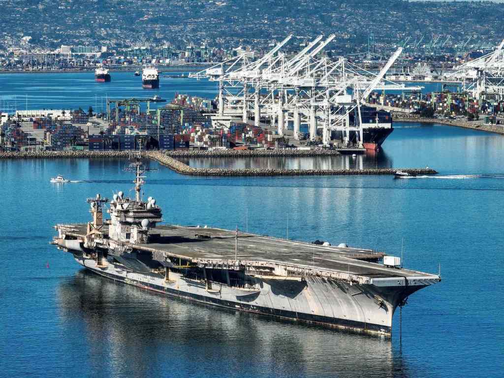 1024x768 Retired Vietnam Era Aircraft Carrier Kitty Hawk Stops Off In Long Beach On Journey To Scrap Yard