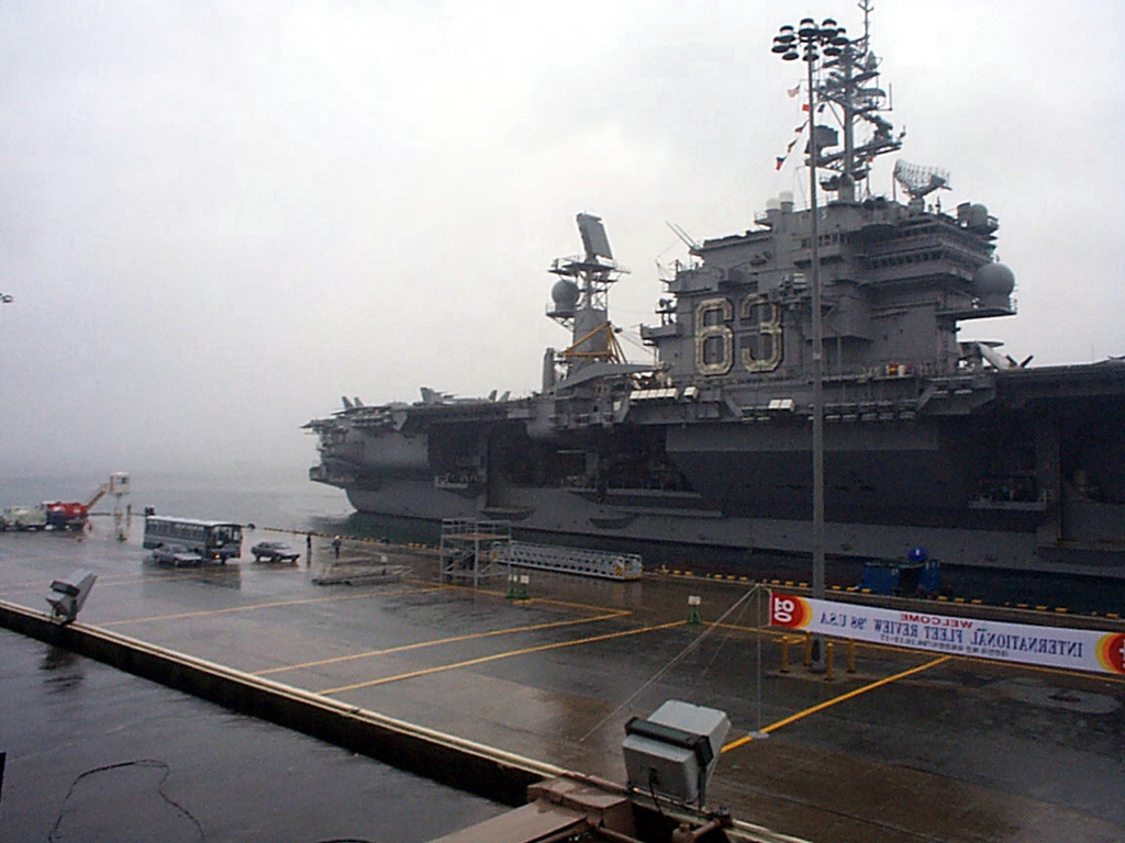 1024x768 Starboard view of USS KITTY HAWK (CV63) after arriving