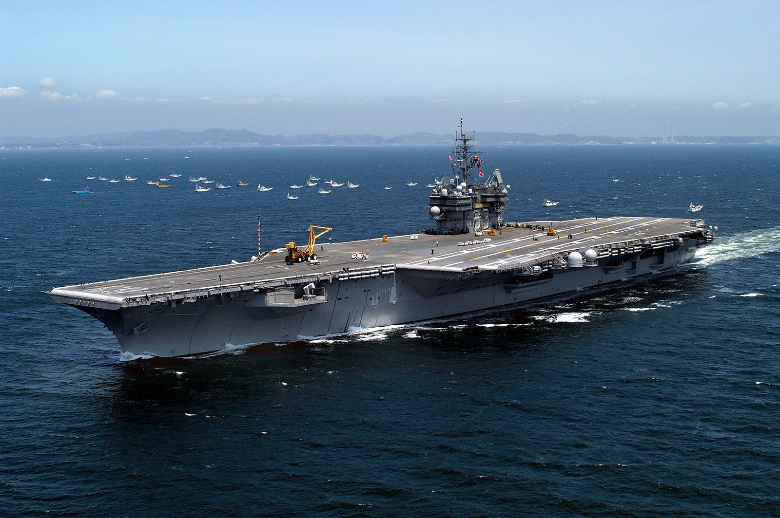1600x1064 Kitty Hawk: US aircraft carrier, site of a 1972 race riot at sea, on way to scrapyard