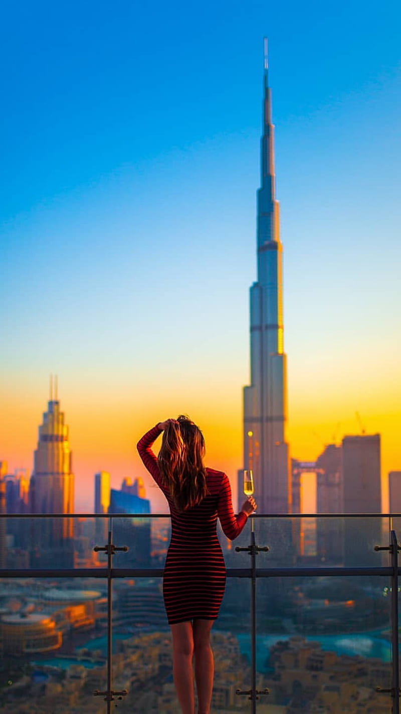 800x1423 Dubai, buildings, burj khalifa, city, girl, model, people, graphy, sunset, vacation, HD phone wallpaper