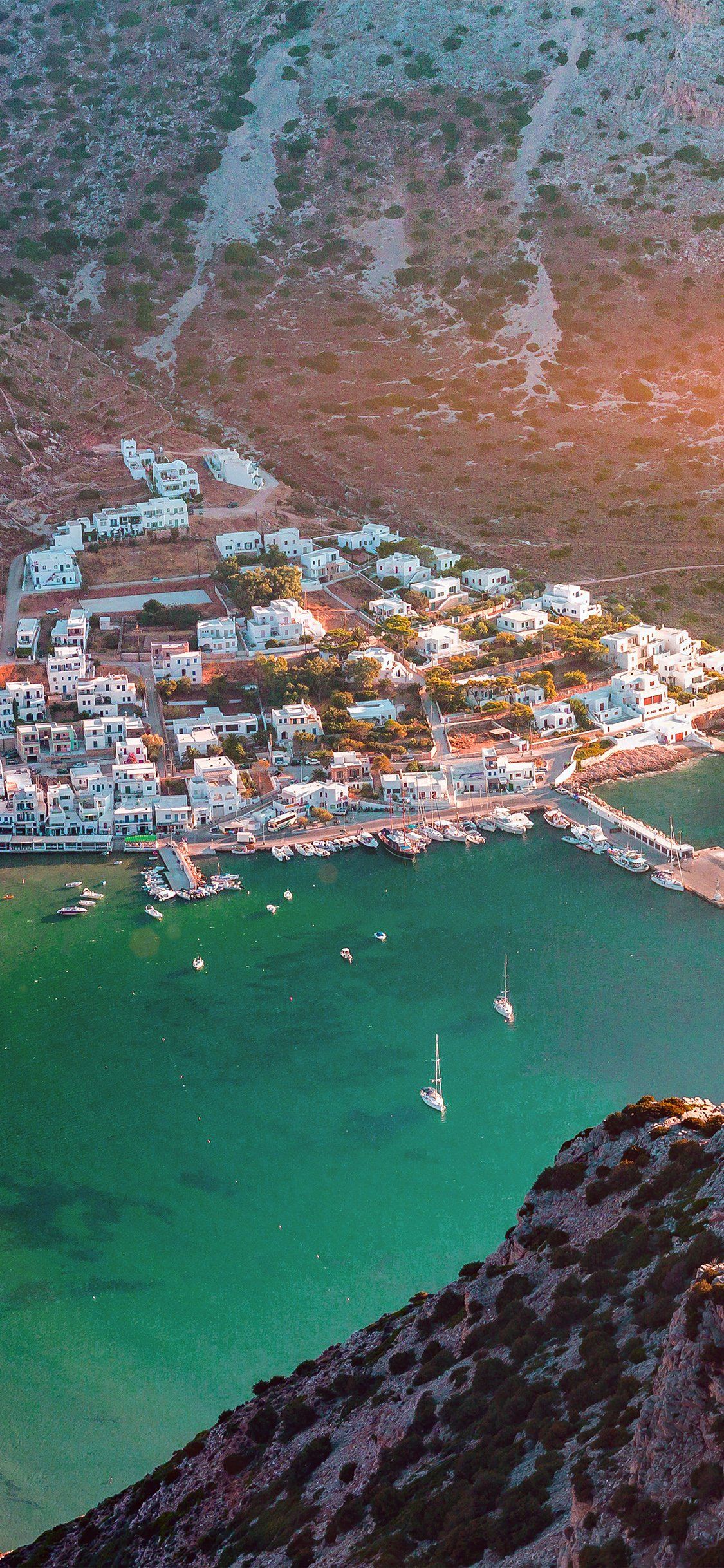 1125x2436 Greece Beach Town Sea Mountain Summer Vacation Flare iPhone Wallpaper