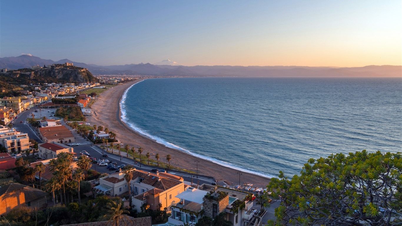 1366x768 Coastal Town illuminated Dusk Calm sea Summer 5K