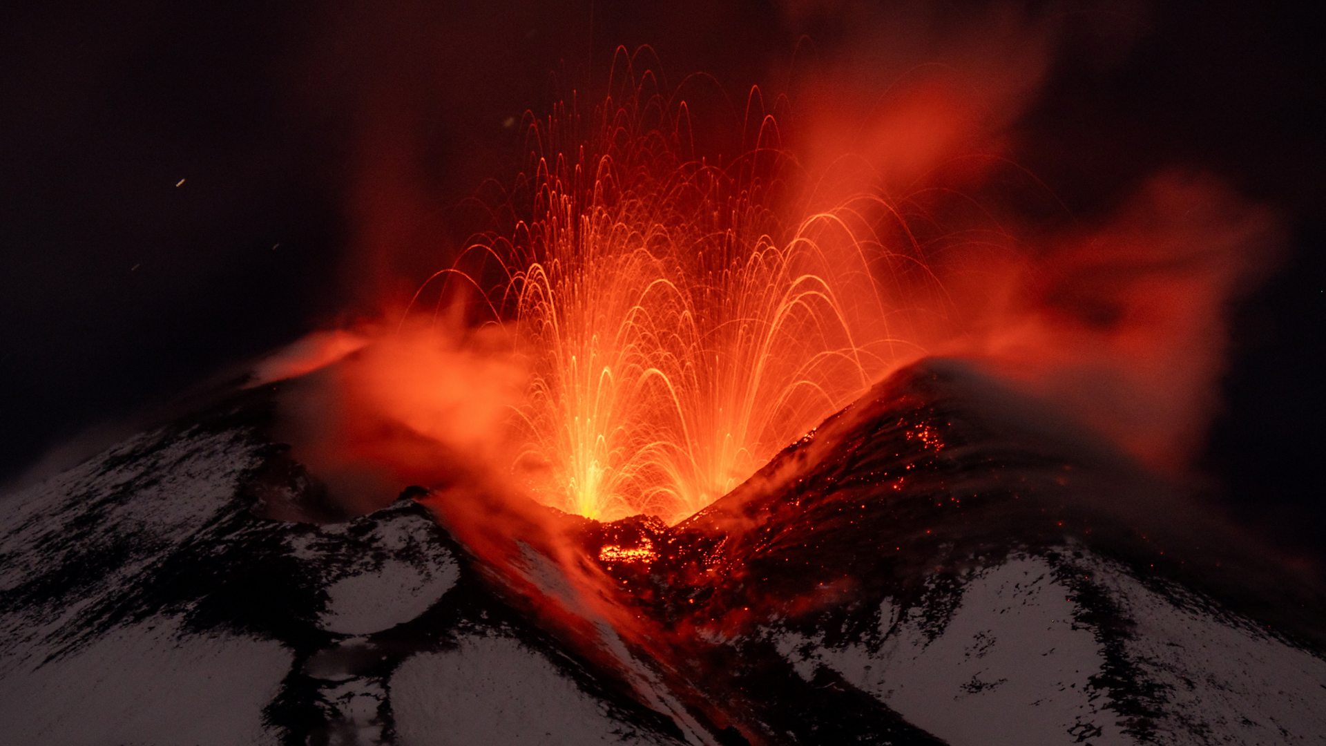 1920x1080 Mount Etna: Volcano sprays lava into Sicily's night sky